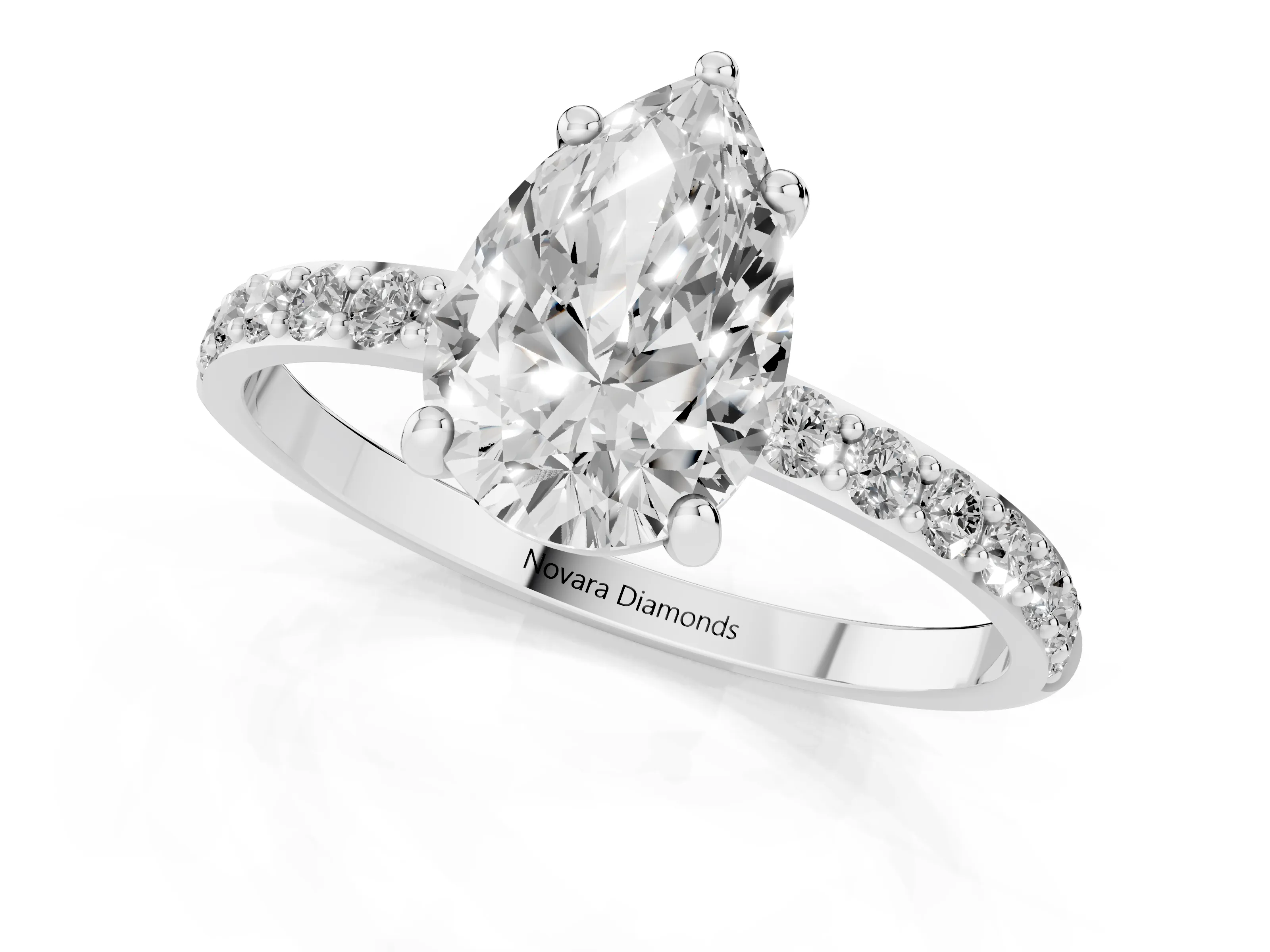 Pear Cut Diamond Solitaire Ring Set in Platinum with Round Pavé Band and Prong Setting