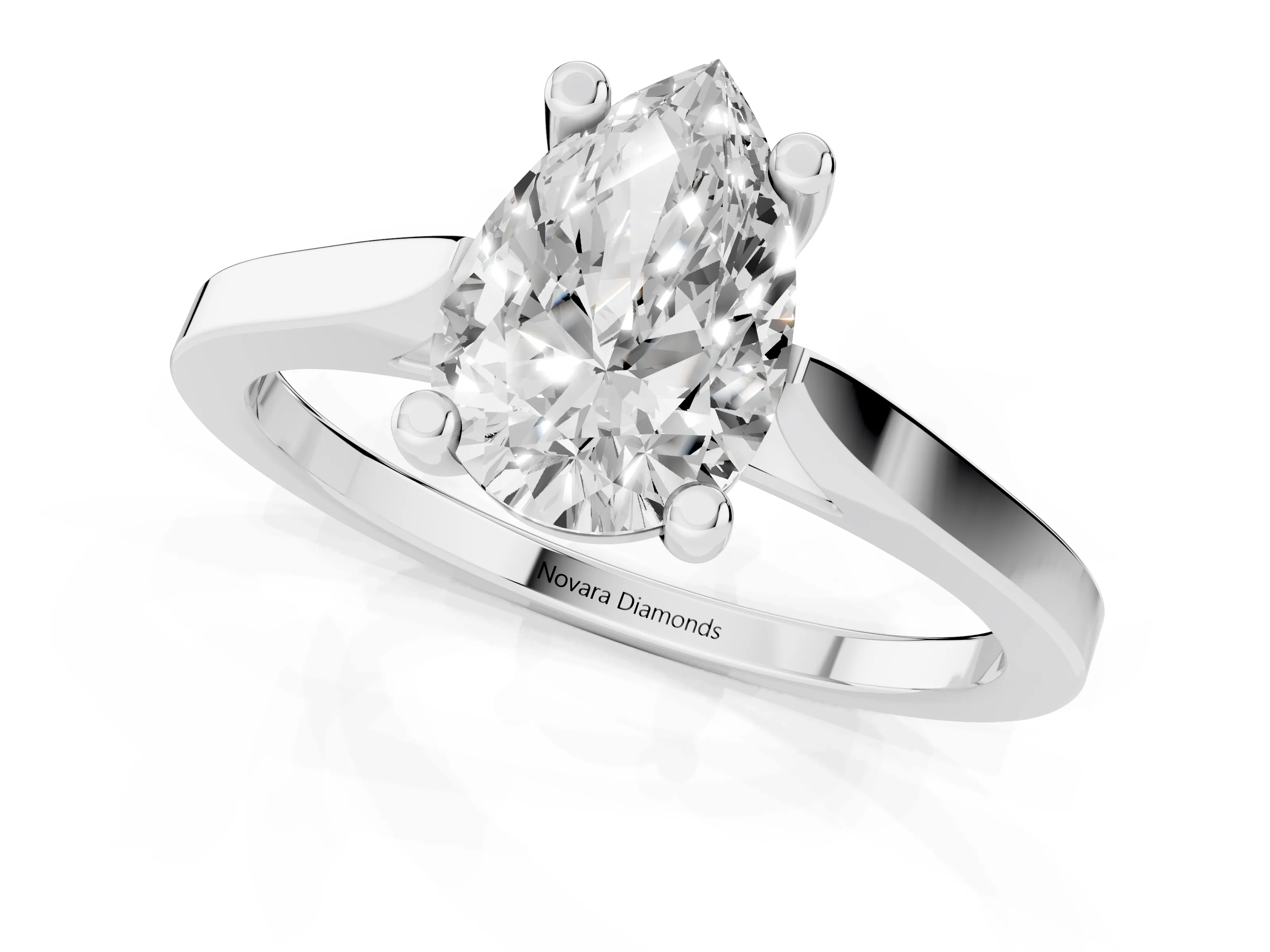 Pear Cut Diamond Solitaire Ring Set in Silver with Prong Setting and Tapered Band
