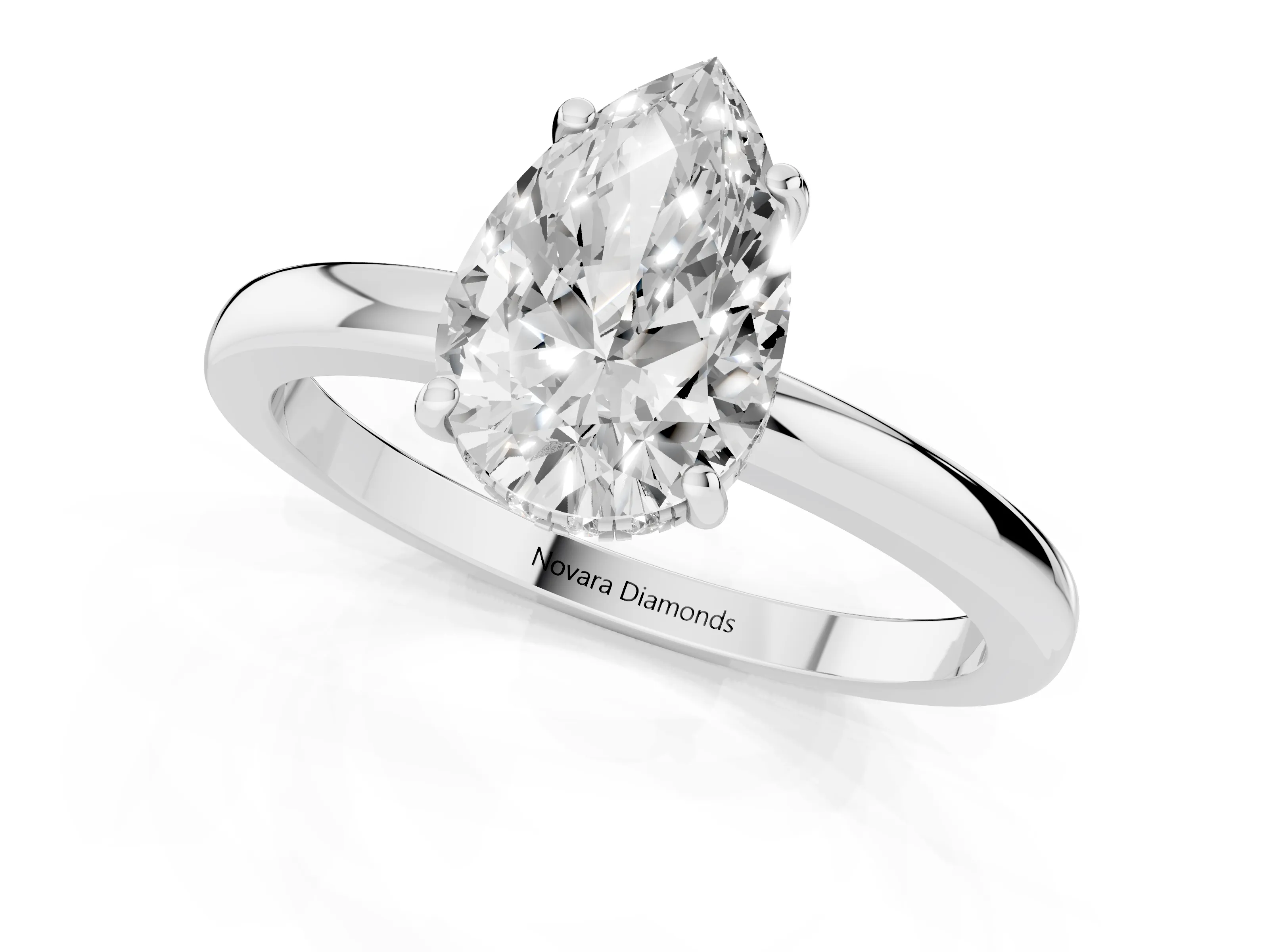 Pear Cut Diamond Solitaire Ring Set in Platinum with Plain Band and Prong Setting