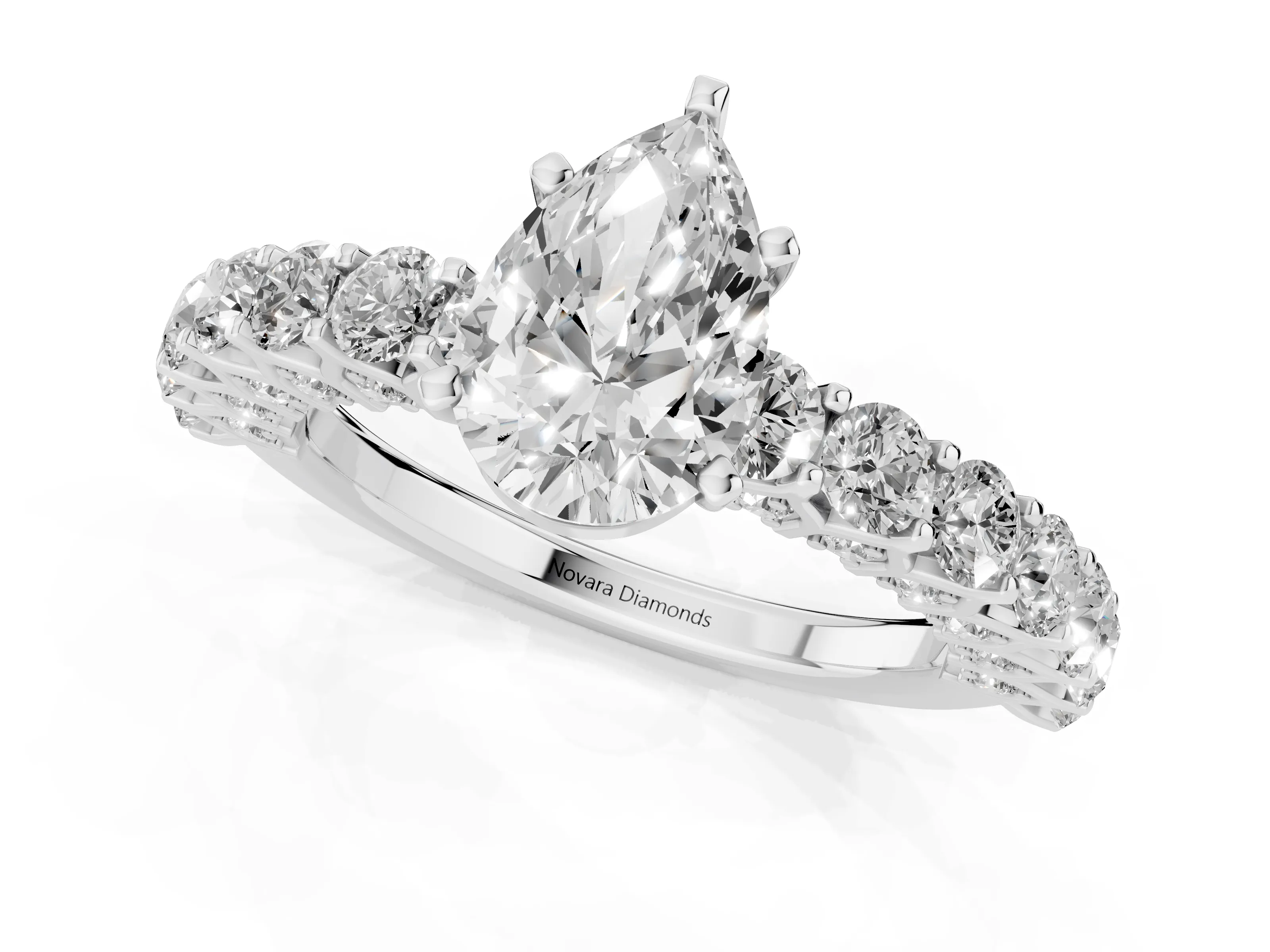 Pear Cut Diamond Solitaire Ring Set in Platinum with Shared Prong Pavé Band