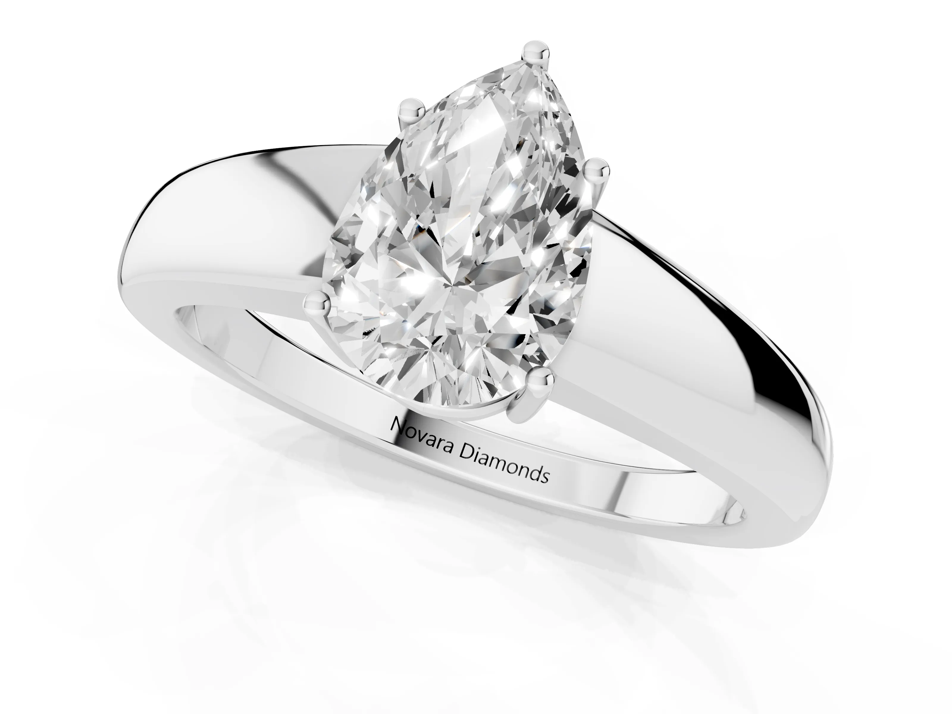 Pear Cut Diamond Solitaire Ring Set in White gold with Tapered Band and Prong Setting
