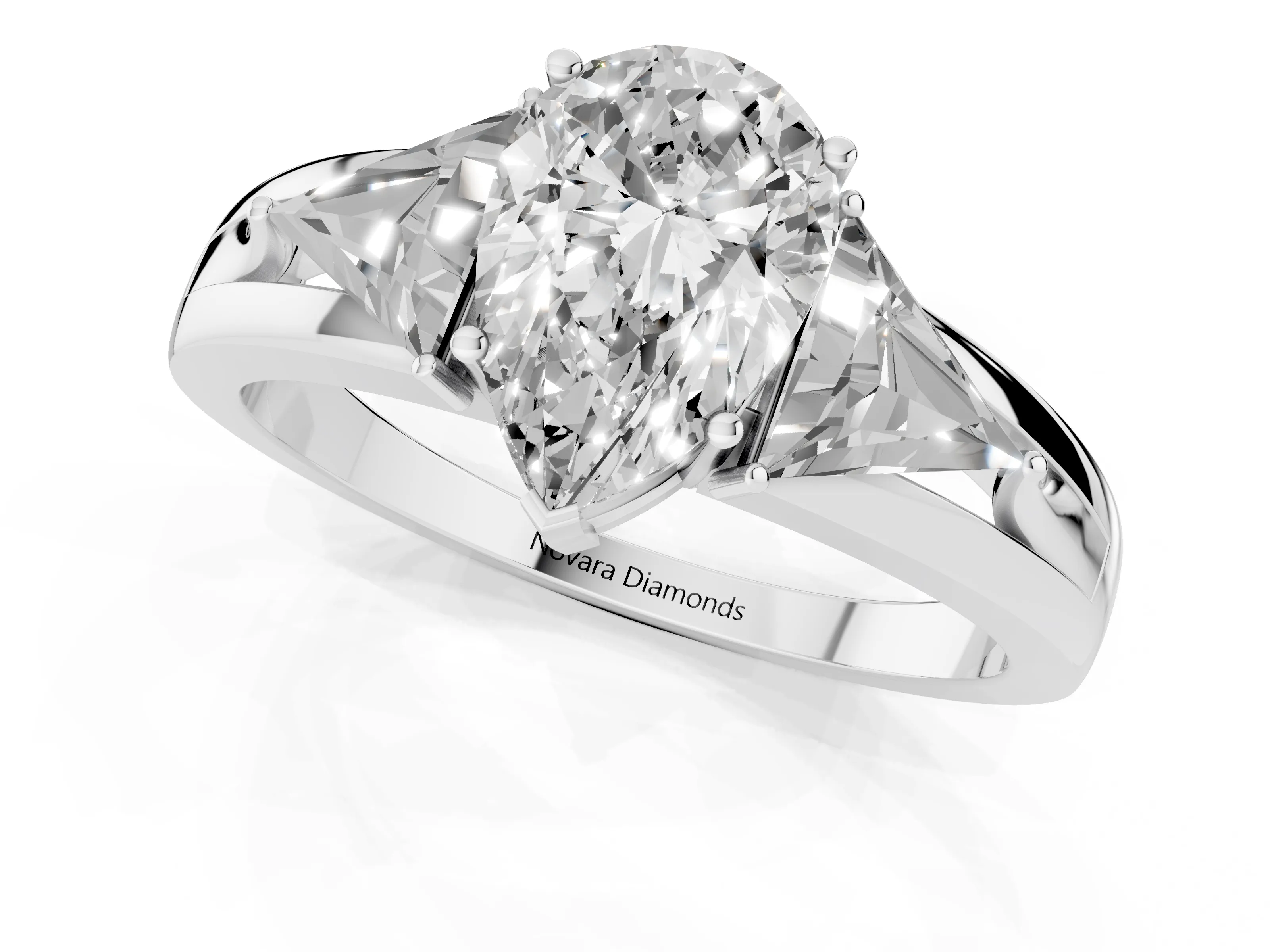 Pear Cut Diamond Three-Stone Ring Set in Platinum with Trillion Side Stones and Split Shank