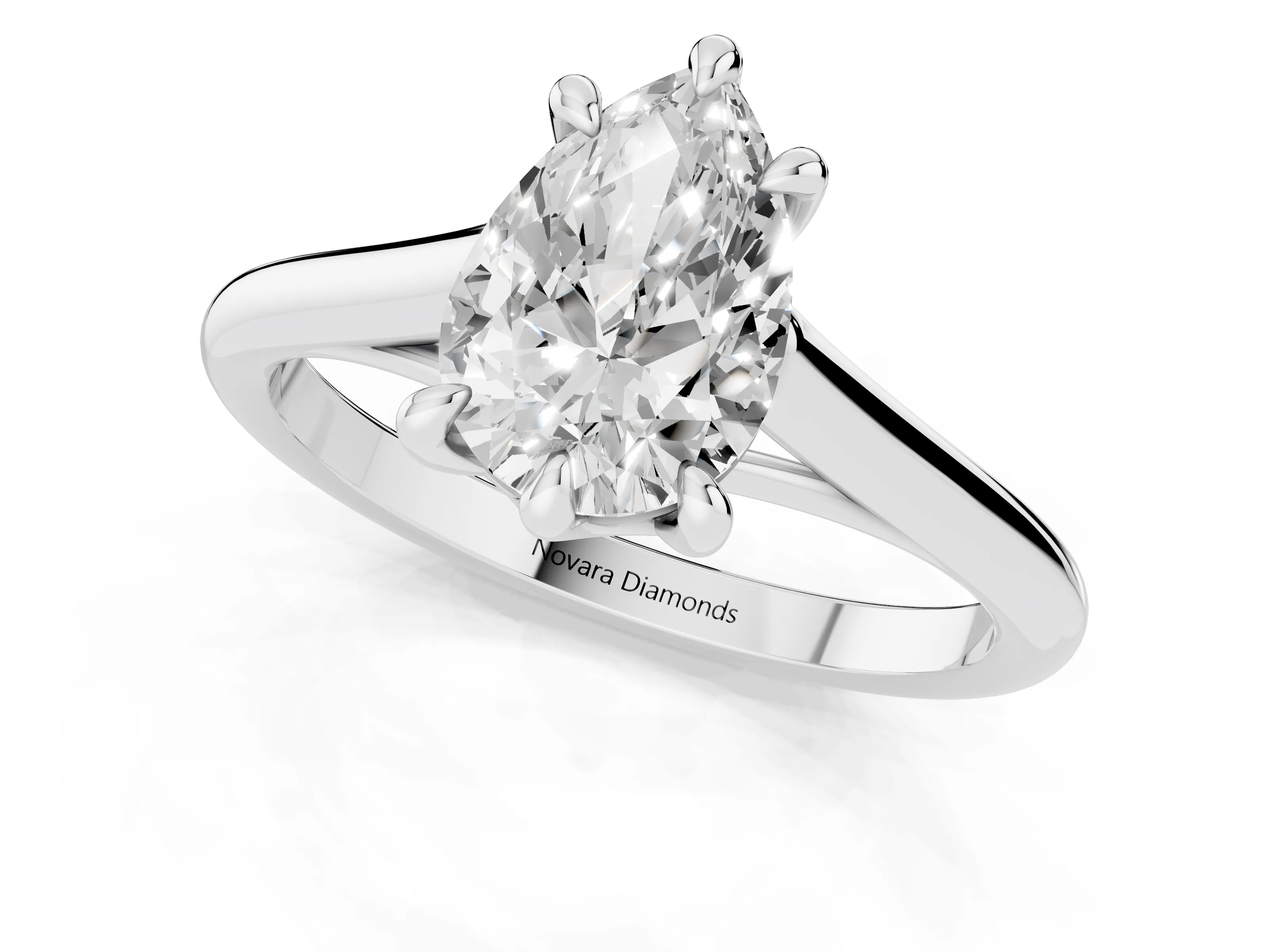 Pear Cut Diamond Solitaire Engagement Ring Set in White gold with Prong Setting and Plain Classic Band