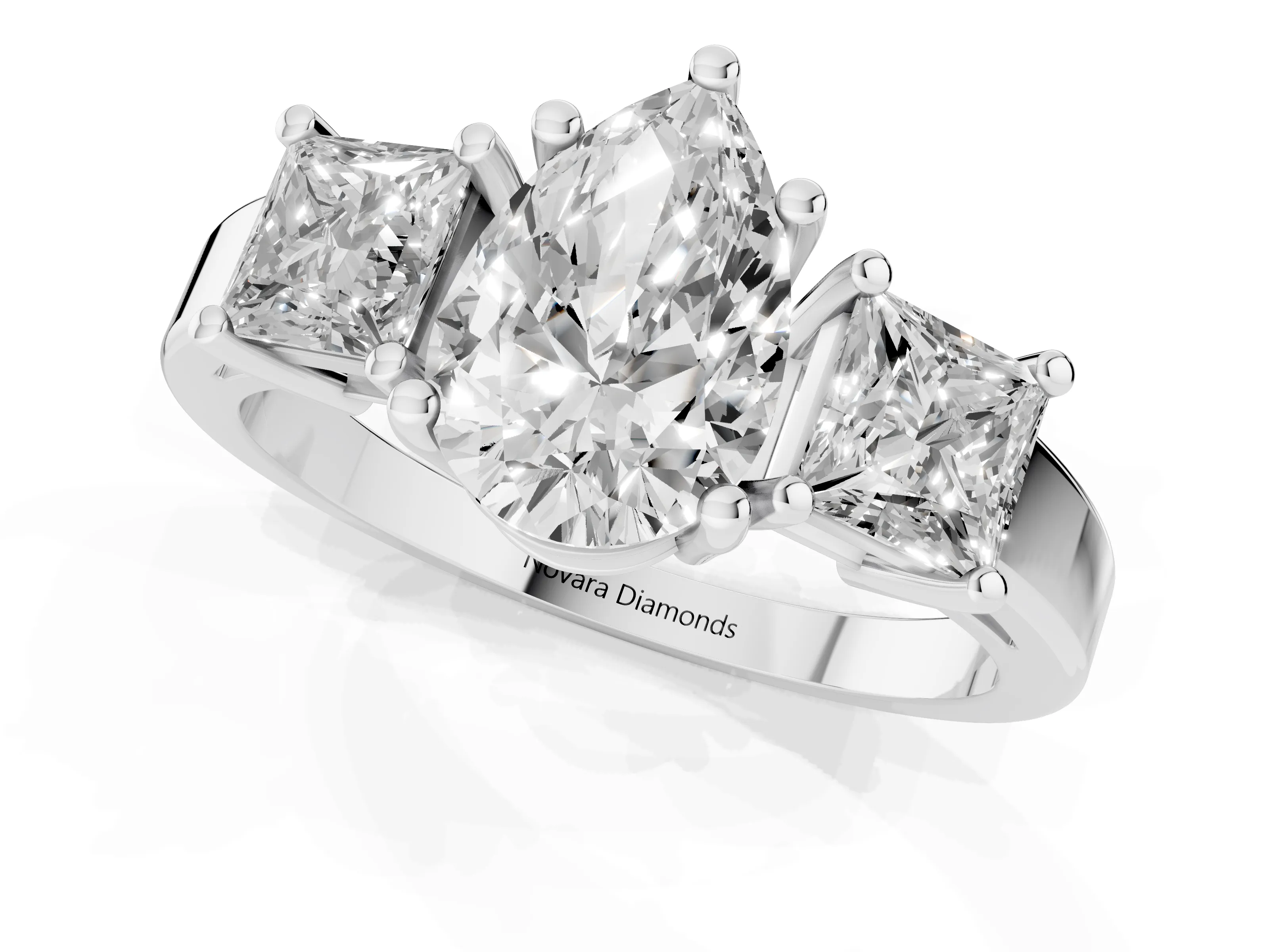 Three-Stone Pear Cut Diamond Solitaire Ring Set in Platinum with Prong Setting