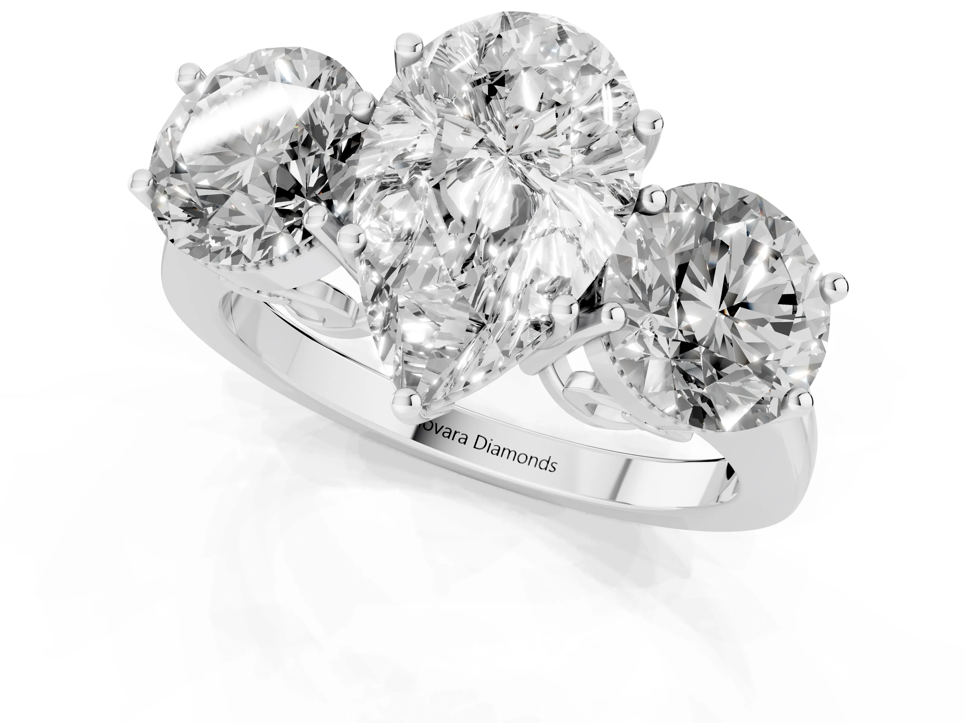 Pear Cut Diamond Three-Stone Engagement Ring Set in Silver with Polished Band
