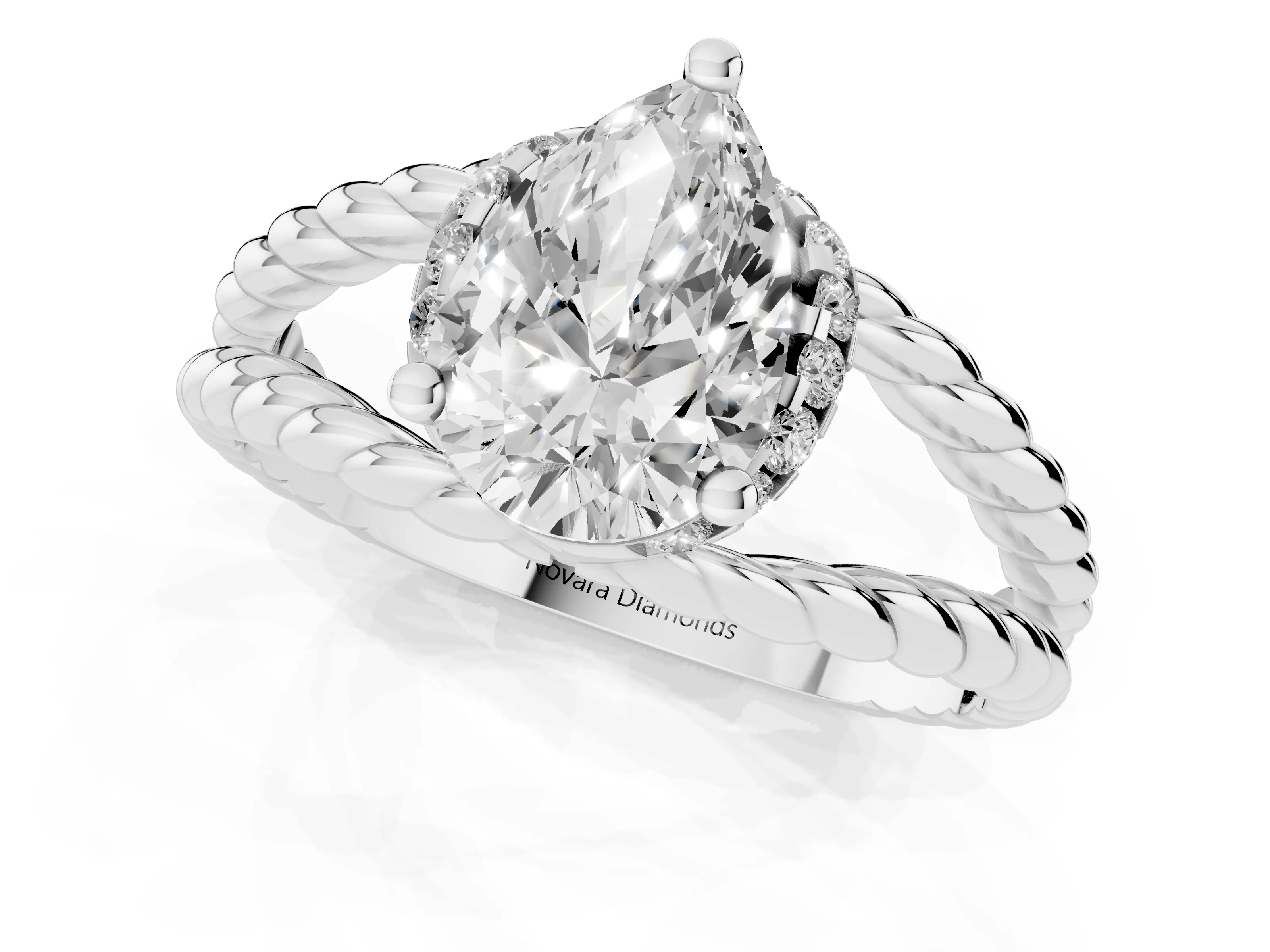 Pear Cut Diamond Halo Ring Set in White gold with Twisted Band and Prong Setting