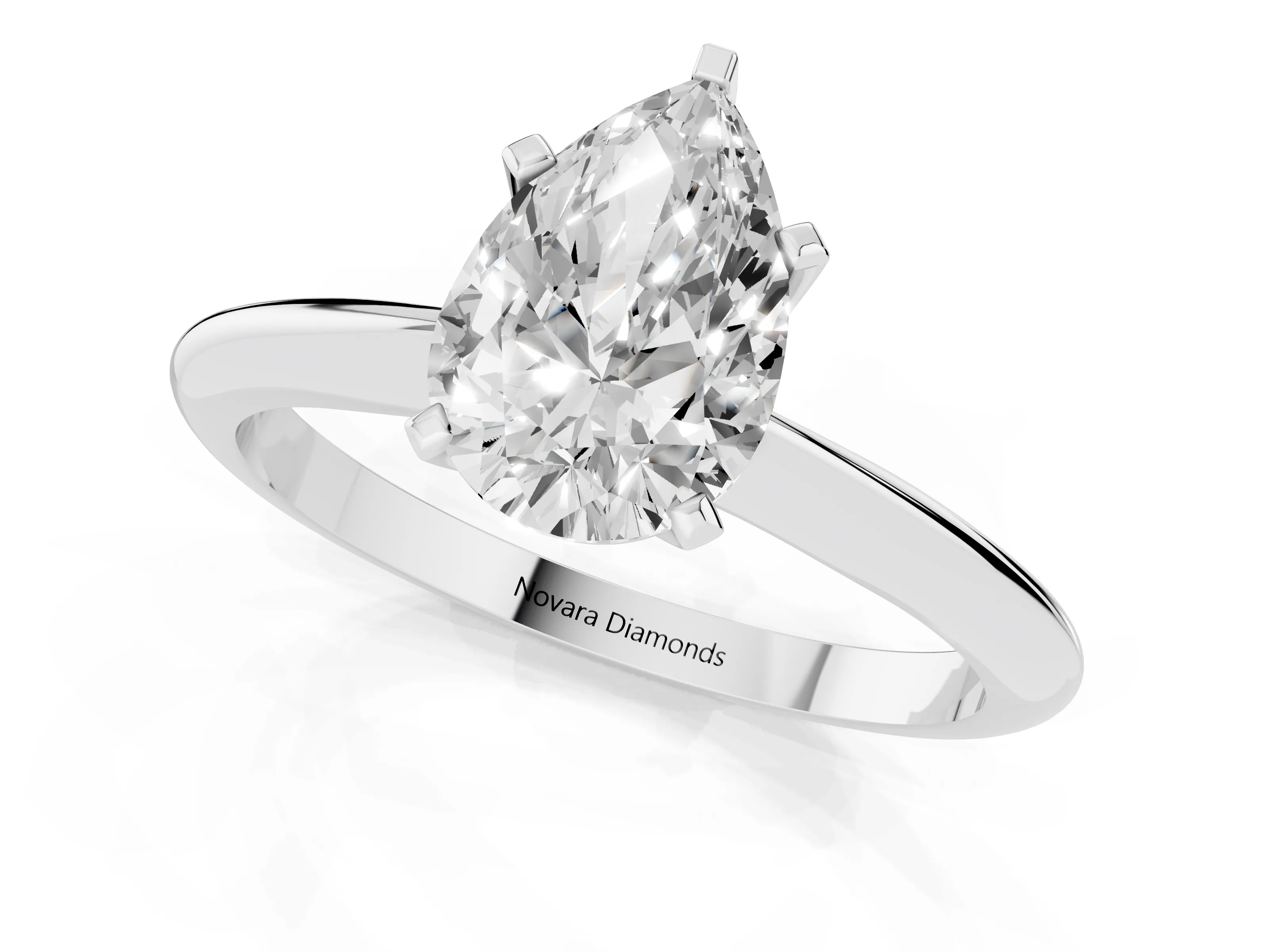 Pear Cut Diamond Solitaire Ring Set in Platinum with Prong Setting on a Plain Round Band – second view