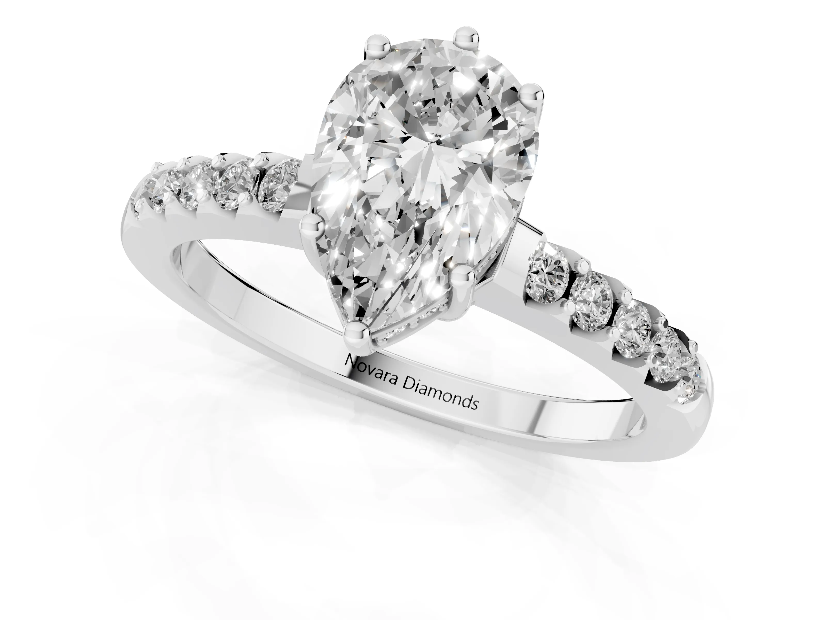 Pear Cut Diamond Solitaire Engagement Ring Set in Platinum with Pavé Band and Prong Setting