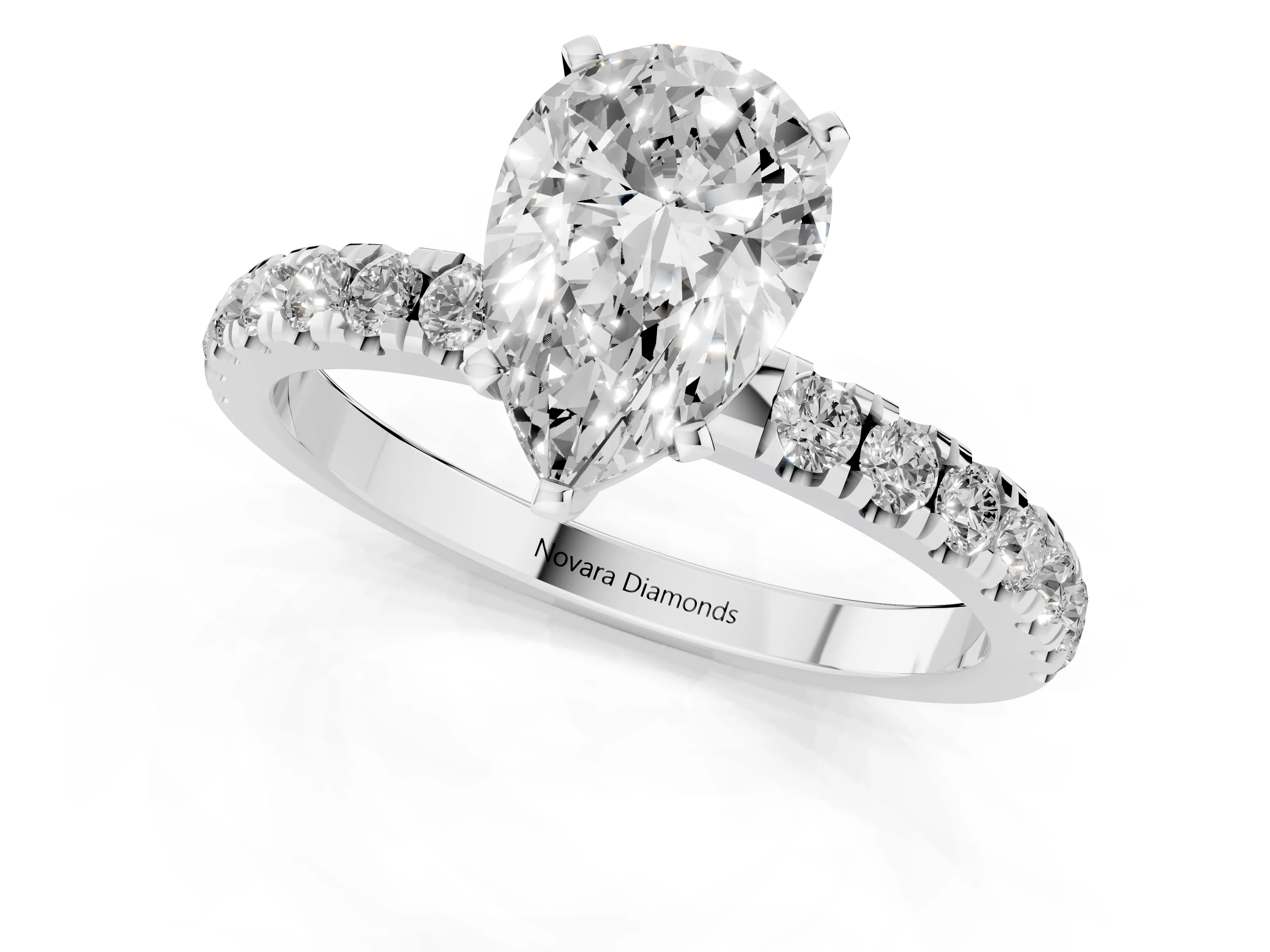 Pear Cut Diamond Solitaire Ring Set in White gold with Pavé Accents and Prong Setting
