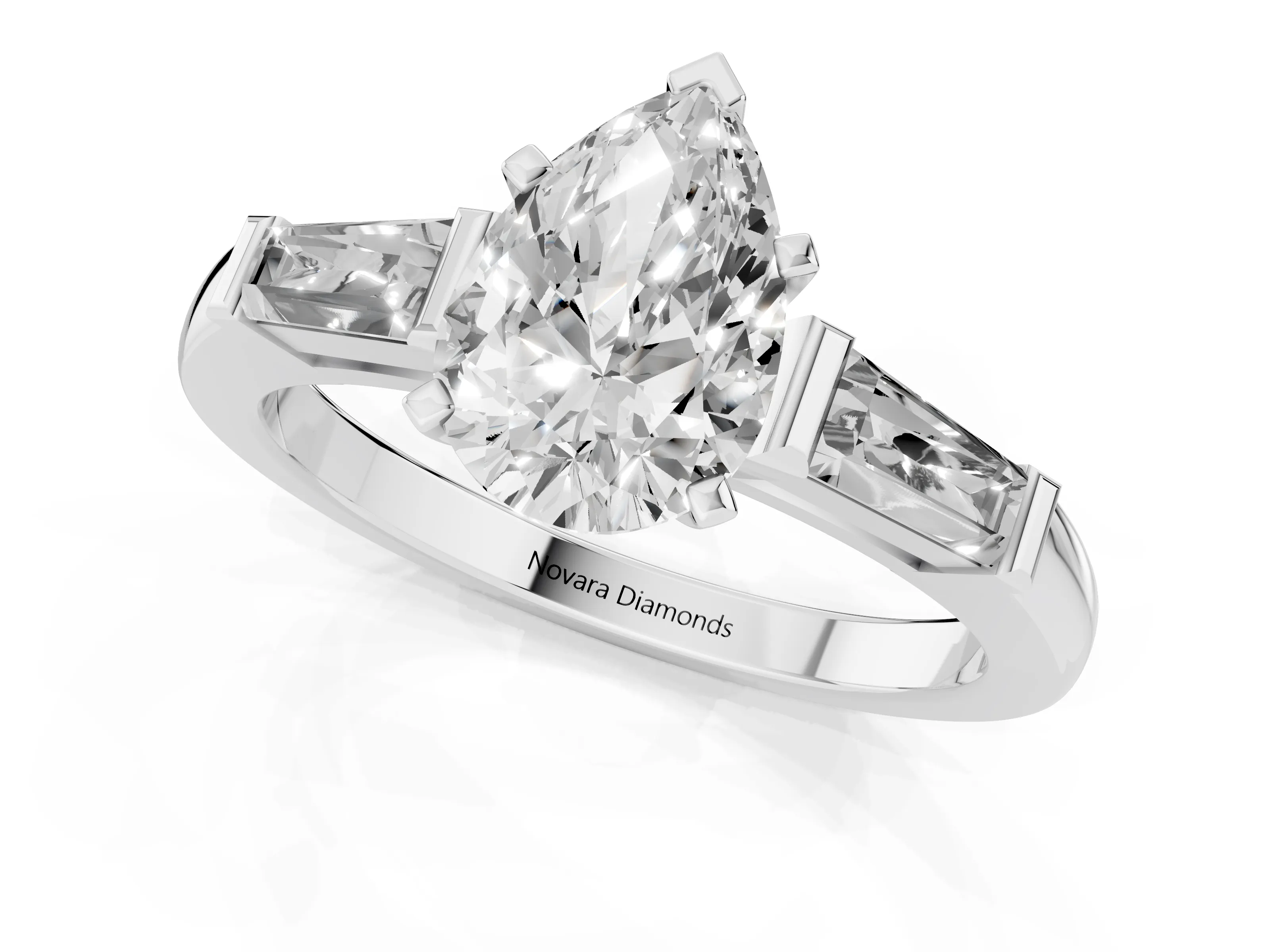Pear Cut Diamond Solitaire Ring Set in Platinum with Tapered Baguette Side Stones and Prong Setting – second view