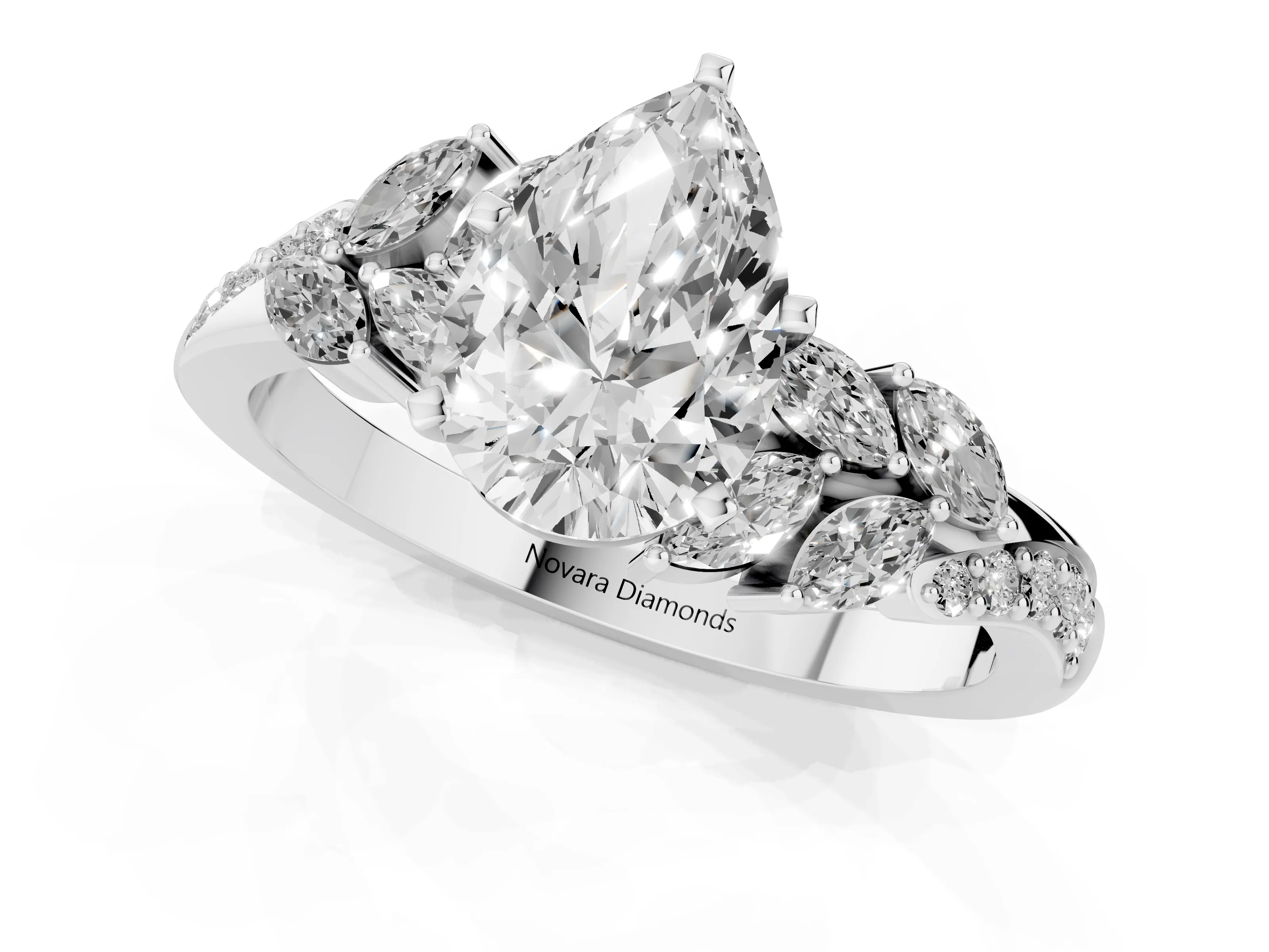 Pear Cut Diamond Solitaire Ring Set in Platinum with Marquise Twist Band and Prong Setting