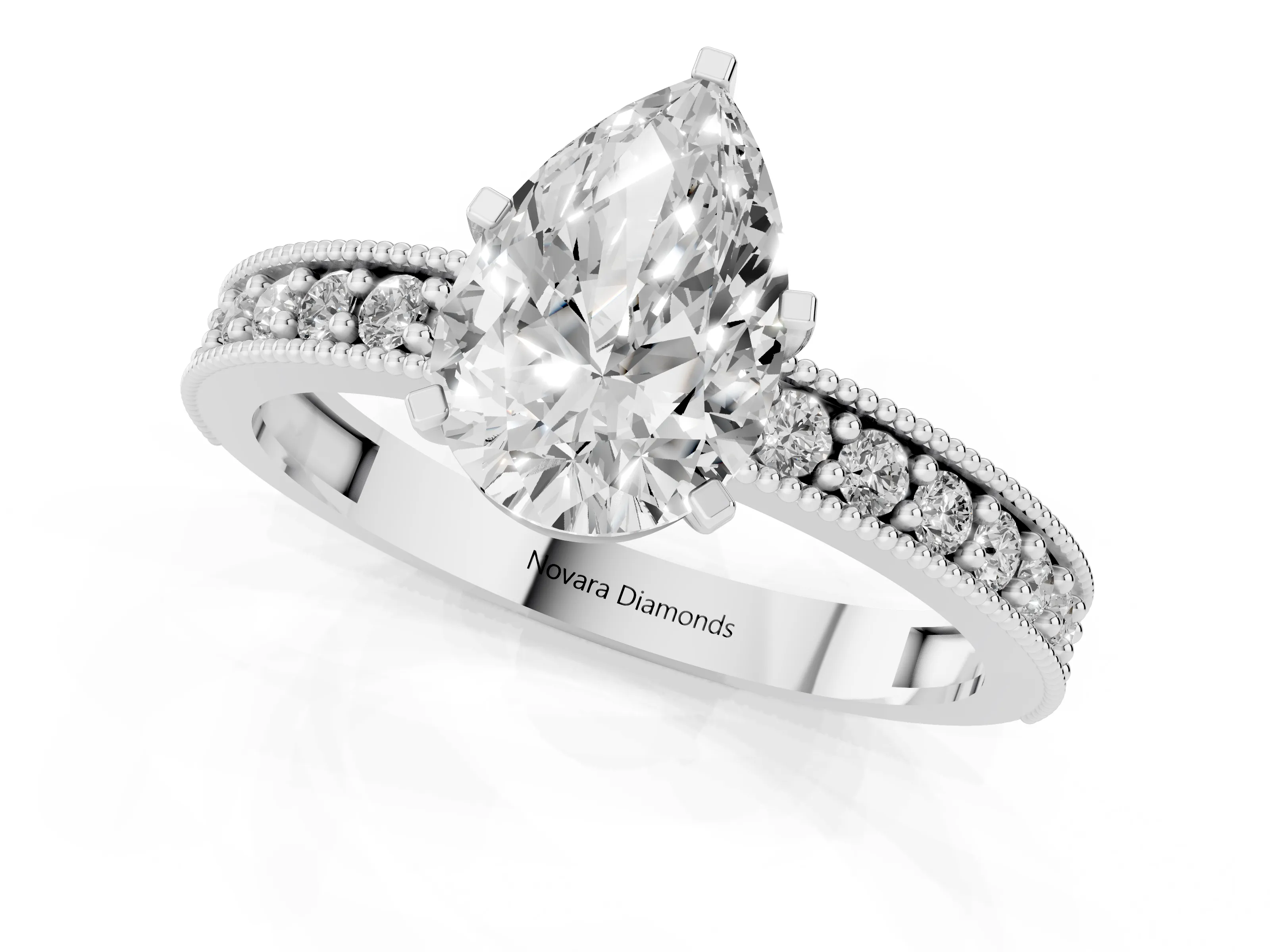 Pear Cut Diamond Milgrain Pavé Engagement Ring Set in White gold with Prong Setting
