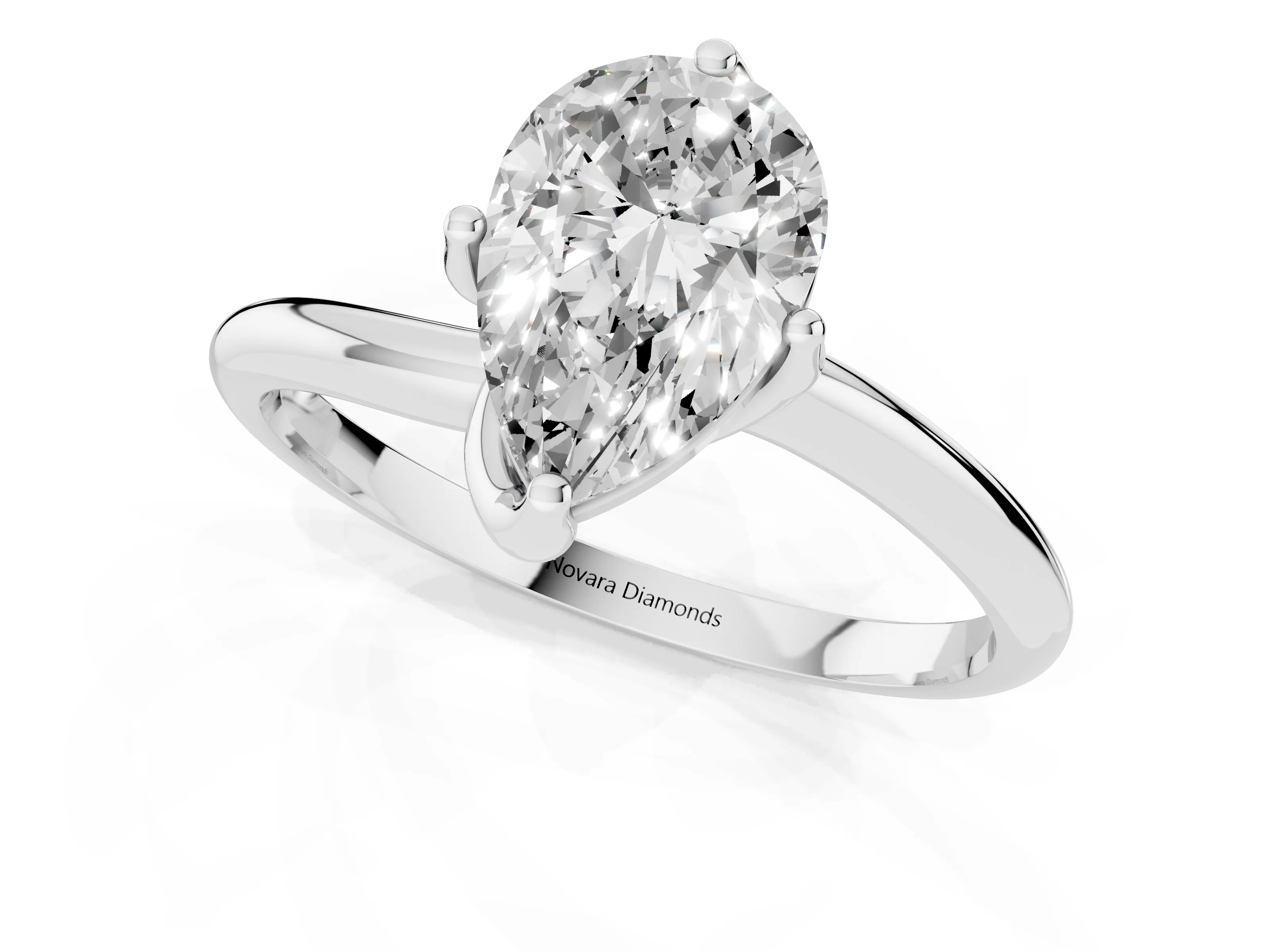 Pear Cut Diamond Solitaire Engagement Ring Set in Platinum with Classic Plain Band