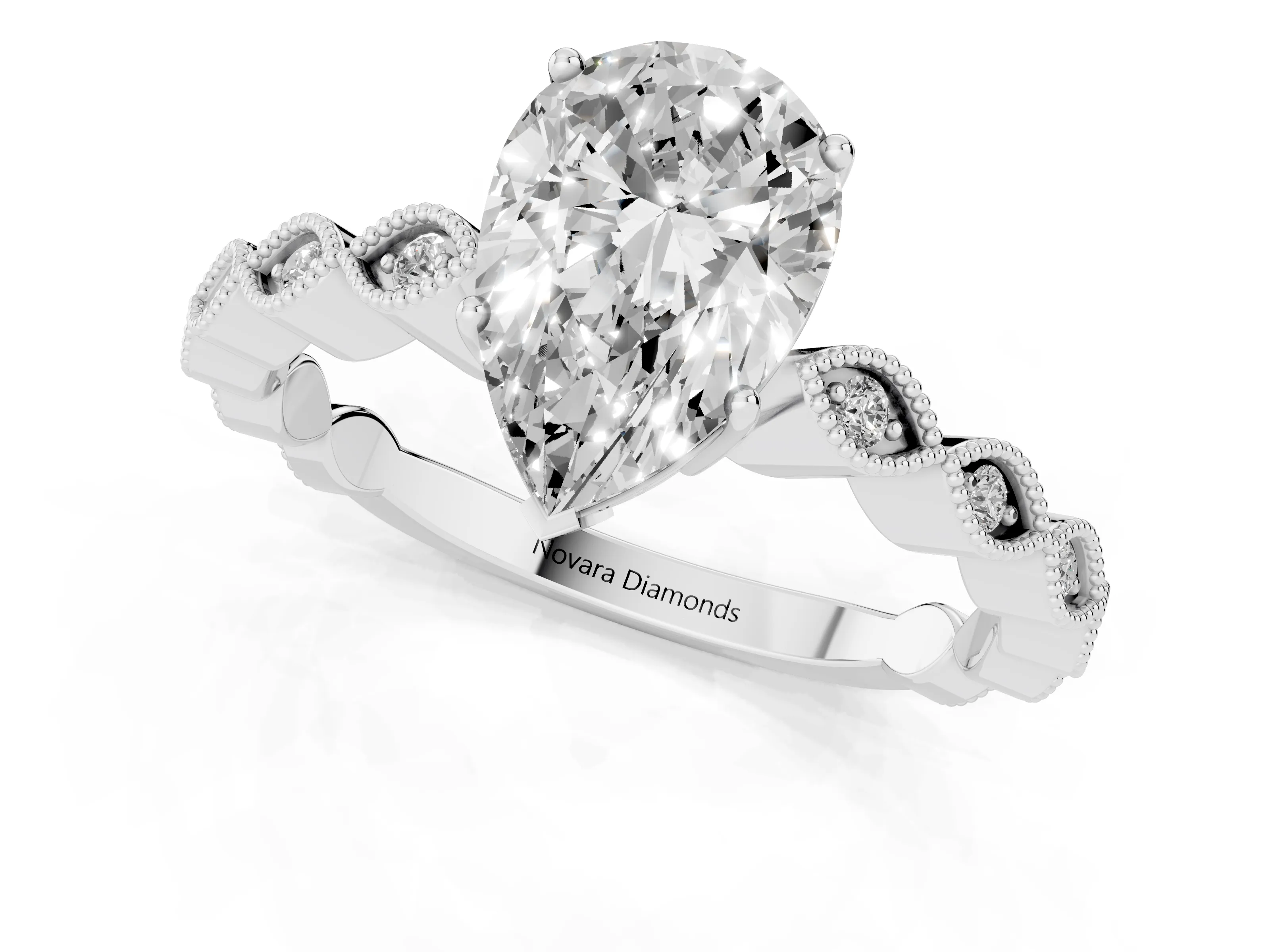 Pear Cut Diamond Solitaire Ring Set in Silver with Infinity Twist Pavé Band