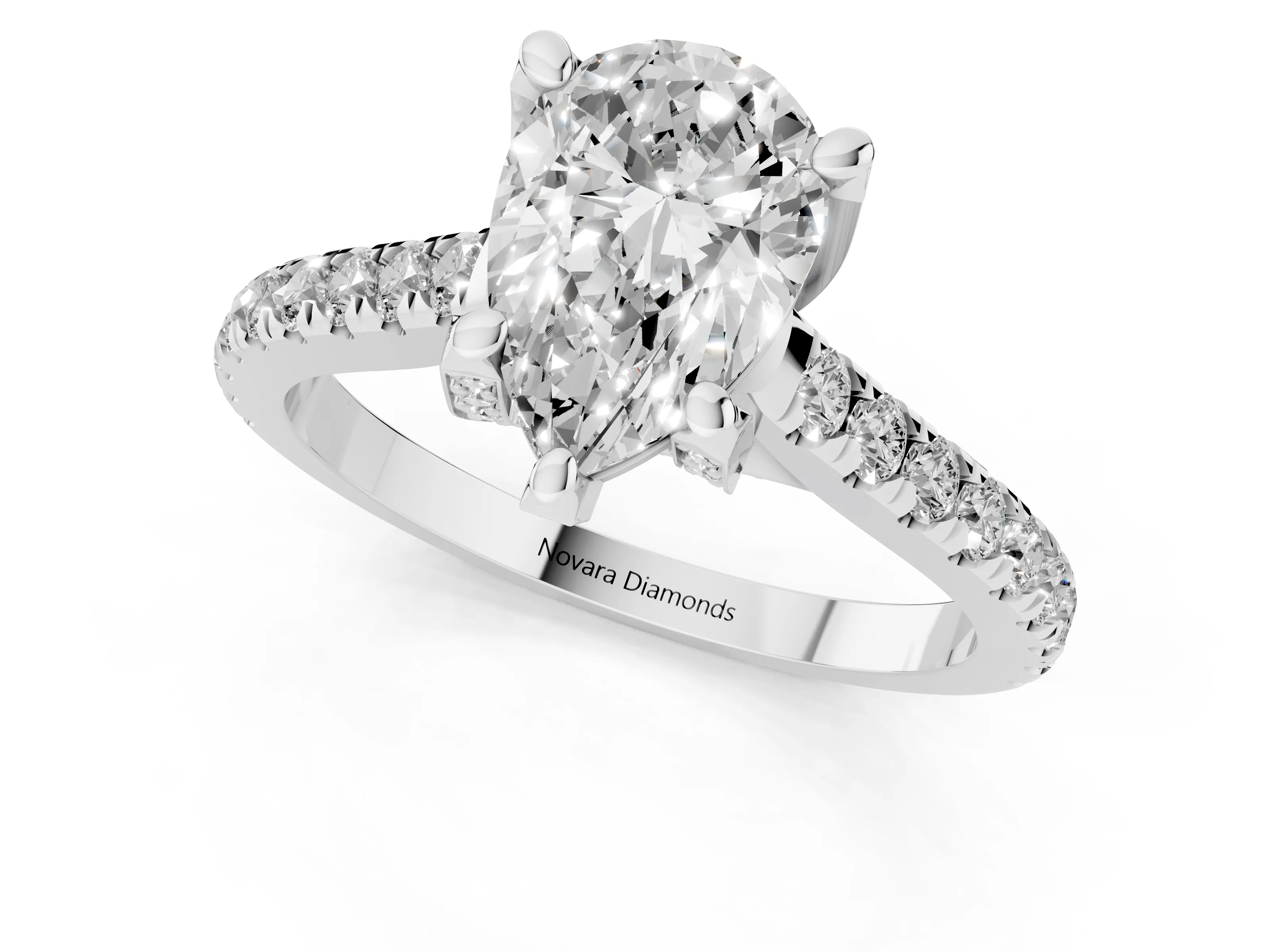 Pear Cut Diamond Solitaire Ring Set in Platinum with Brilliant Pavé Band and Prong Setting