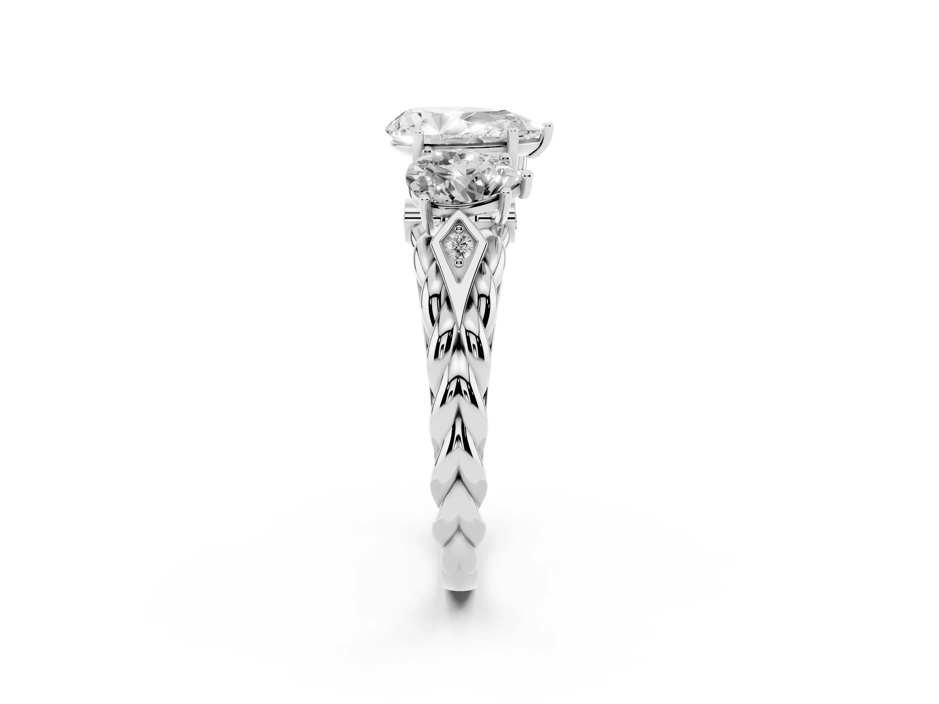 Pear Cut Diamond Three-Stone Ring Set in Platinum with Braided Band
