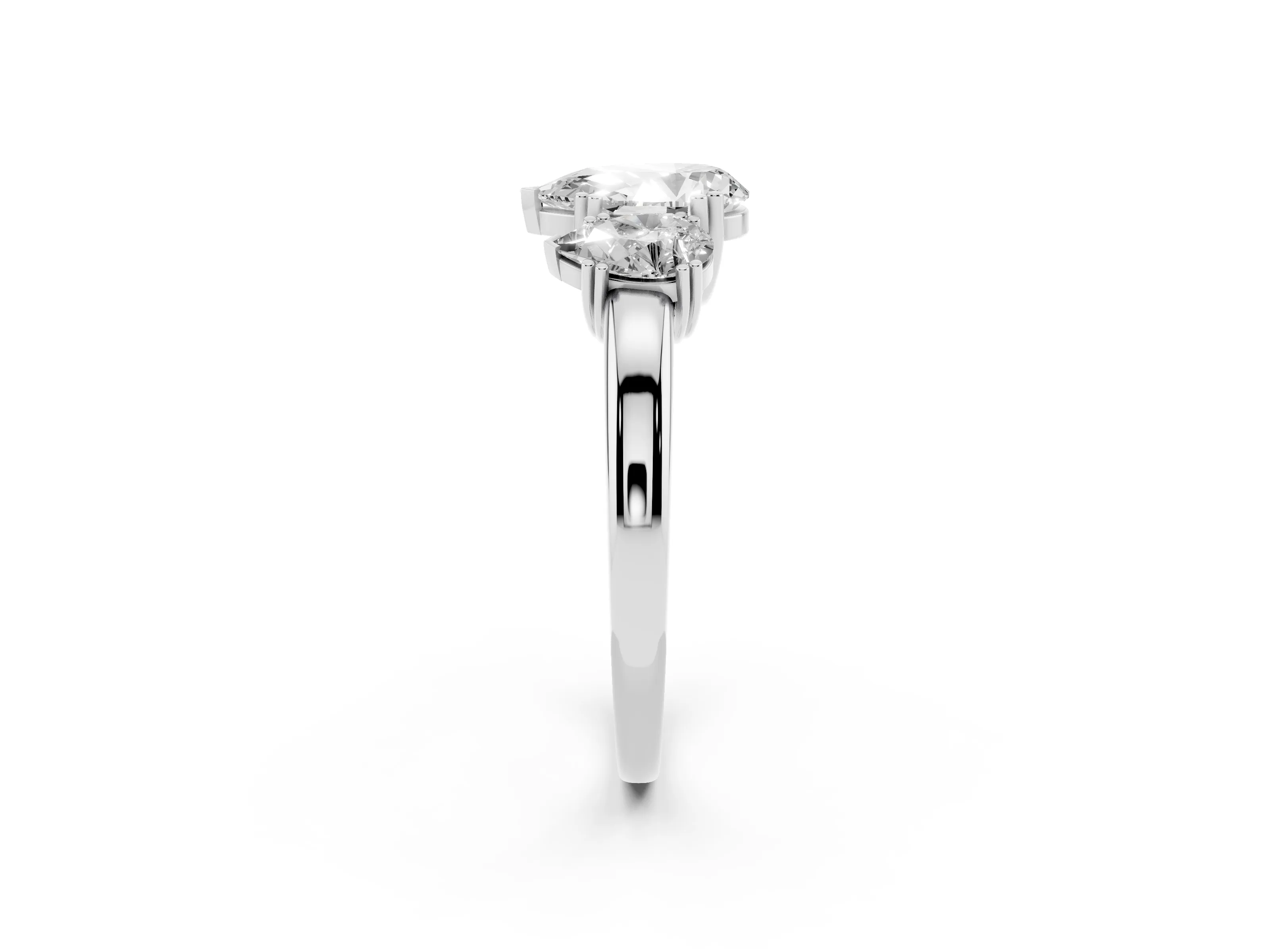 Pear Cut Diamond Three-Stone Ring Set in Platinum with Polished Channel-Set Band