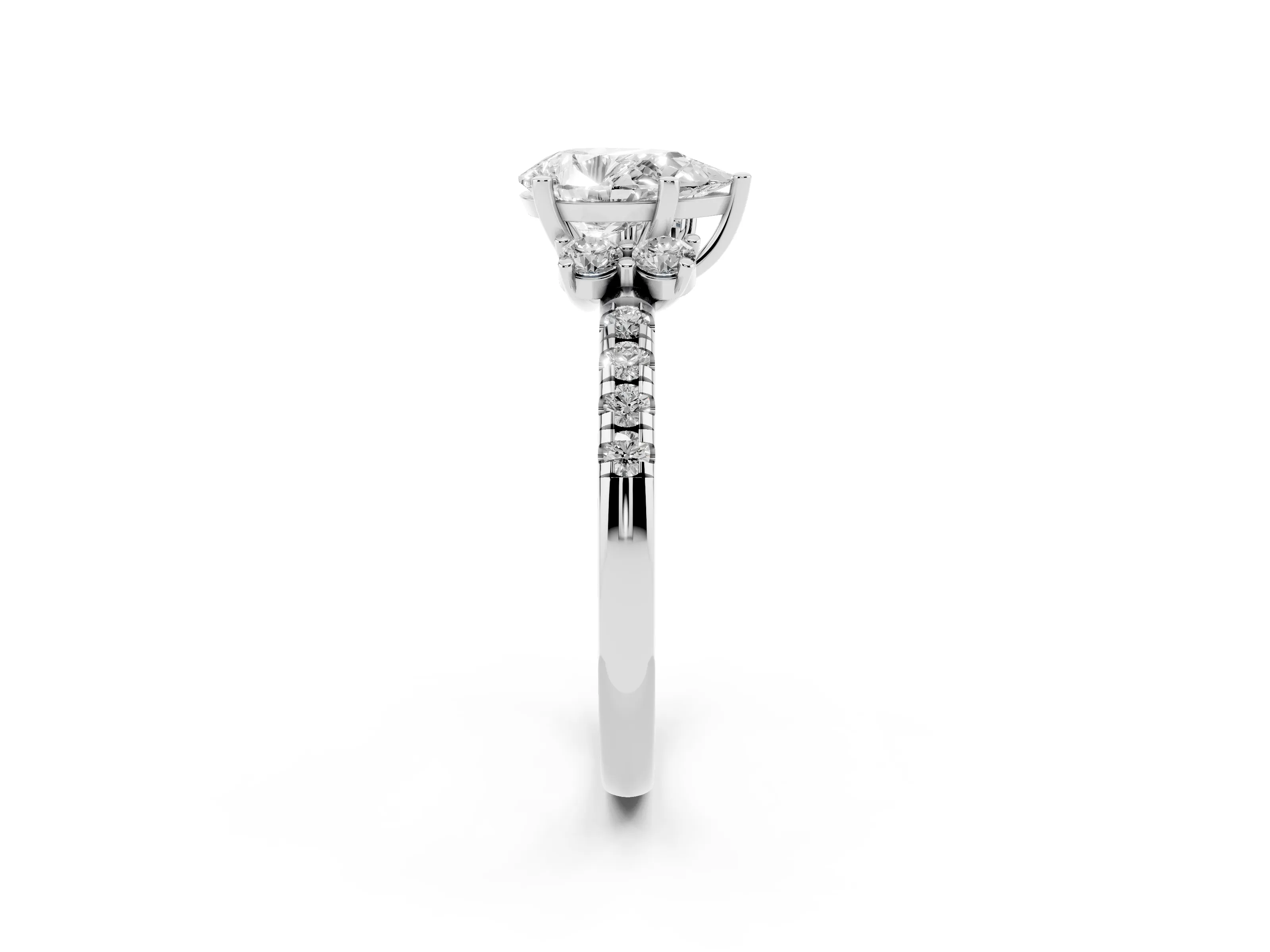Pear Cut Diamond Three-Stone Pavé Ring Set in Platinum with Prong Setting