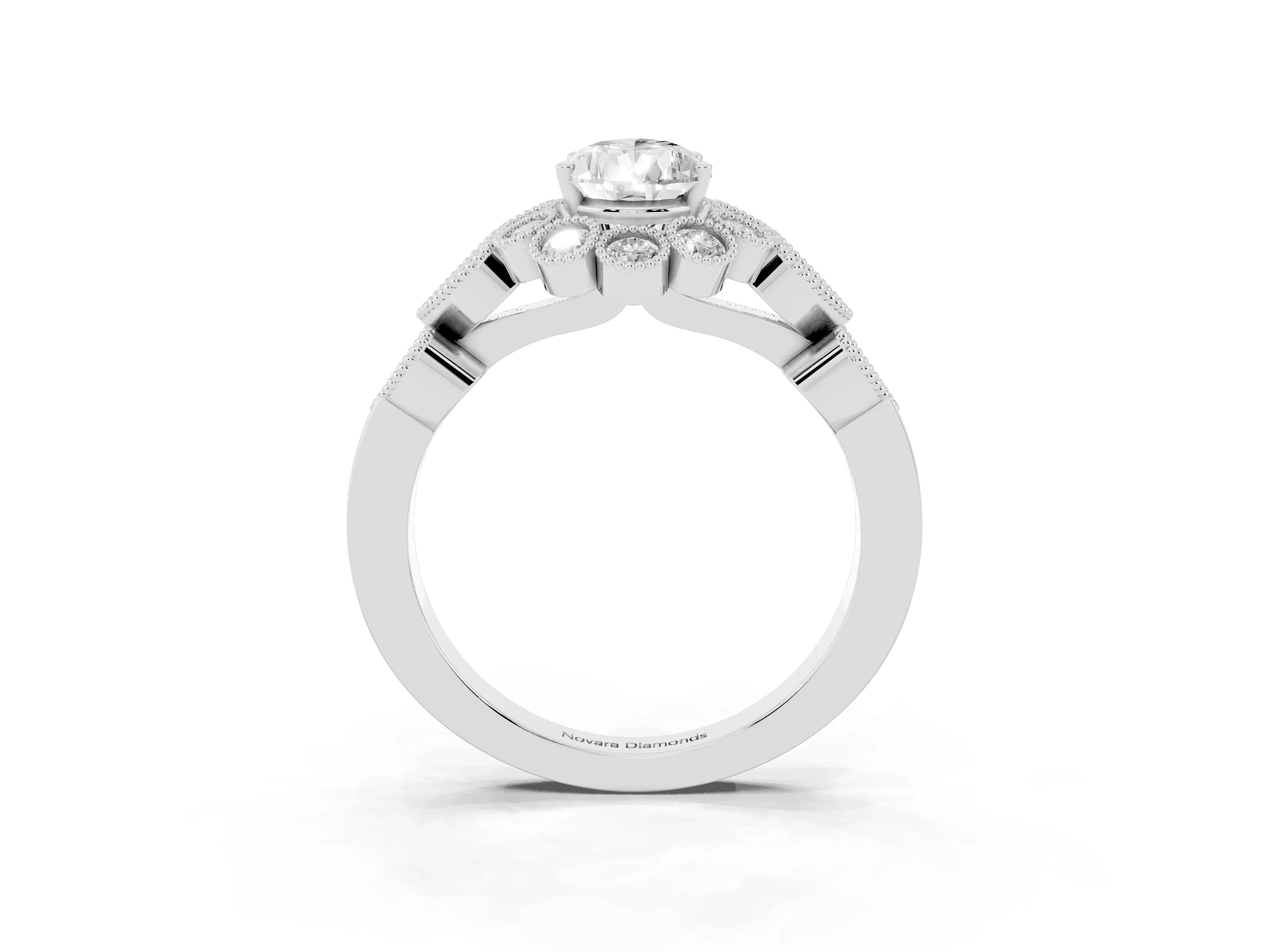 Pear Cut Diamond Solitaire Ring Set in Platinum with Milgrain Pavé Heart Band