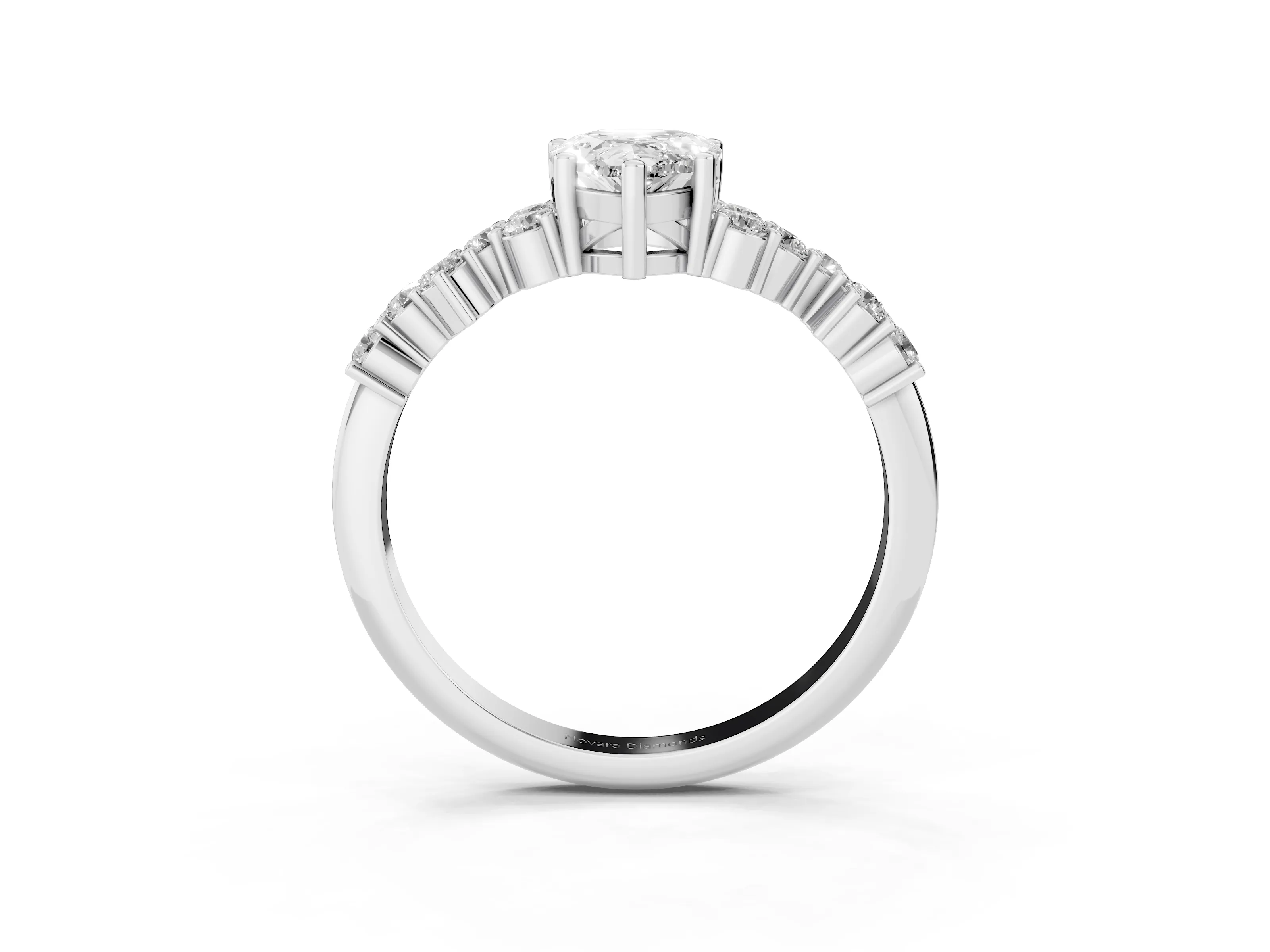 Pear Cut Diamond Ring Set in Platinum with Scattered Round Accents