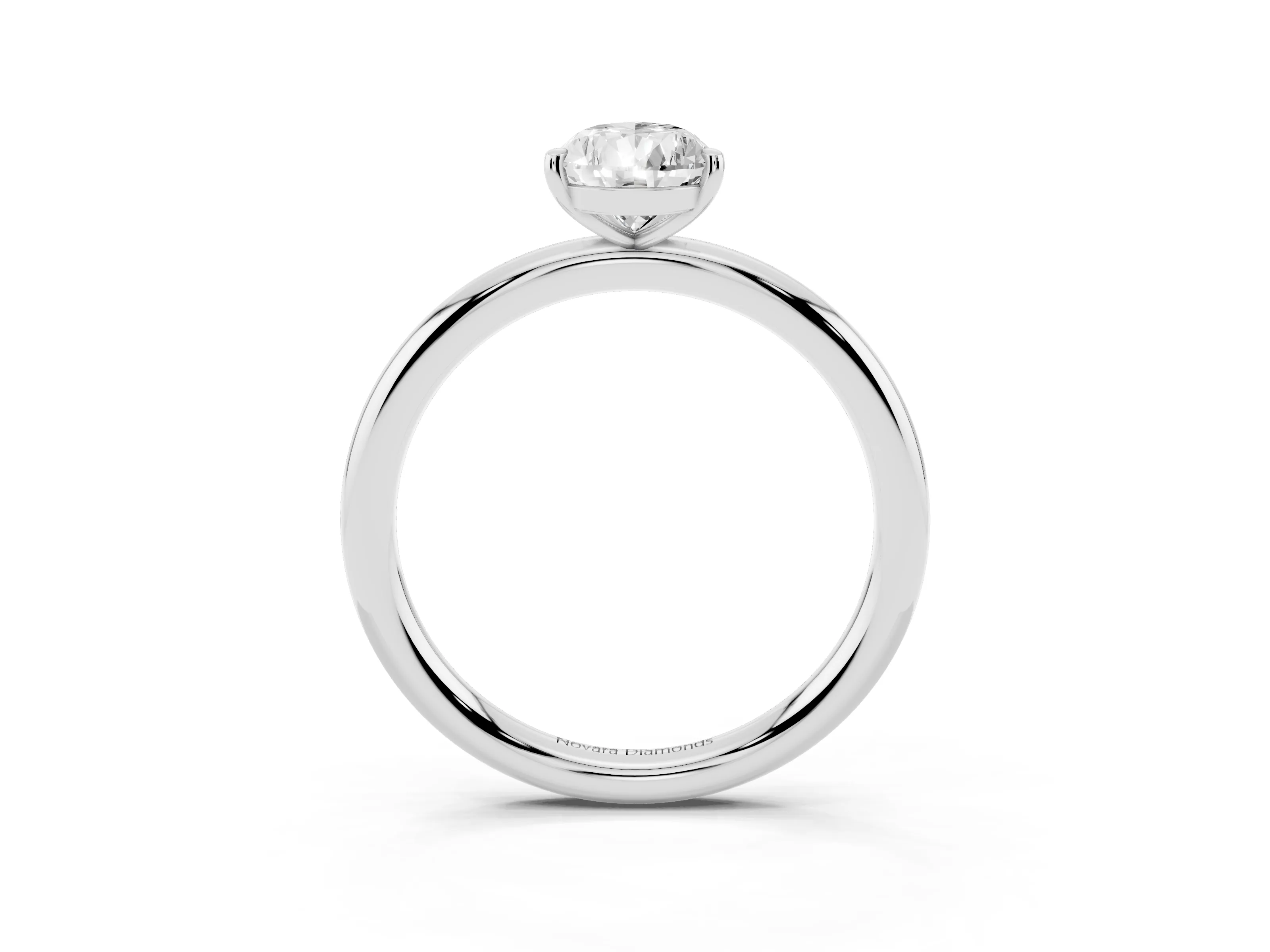 Pear Cut Diamond Solitaire Ring Set in White gold with Prong Setting on a Polished Plain Band