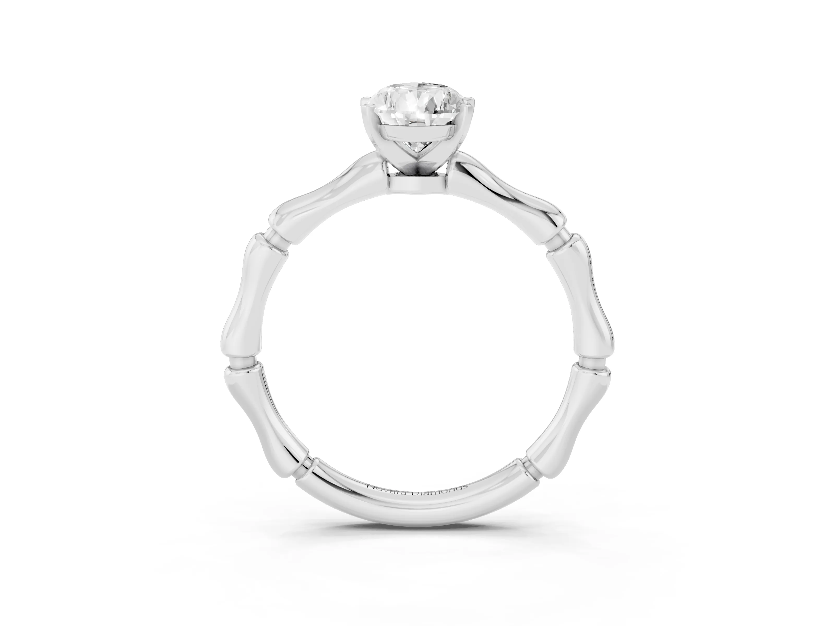 Pear Cut Diamond Solitaire Ring Set in Silver with Bamboo Band and Prong Setting