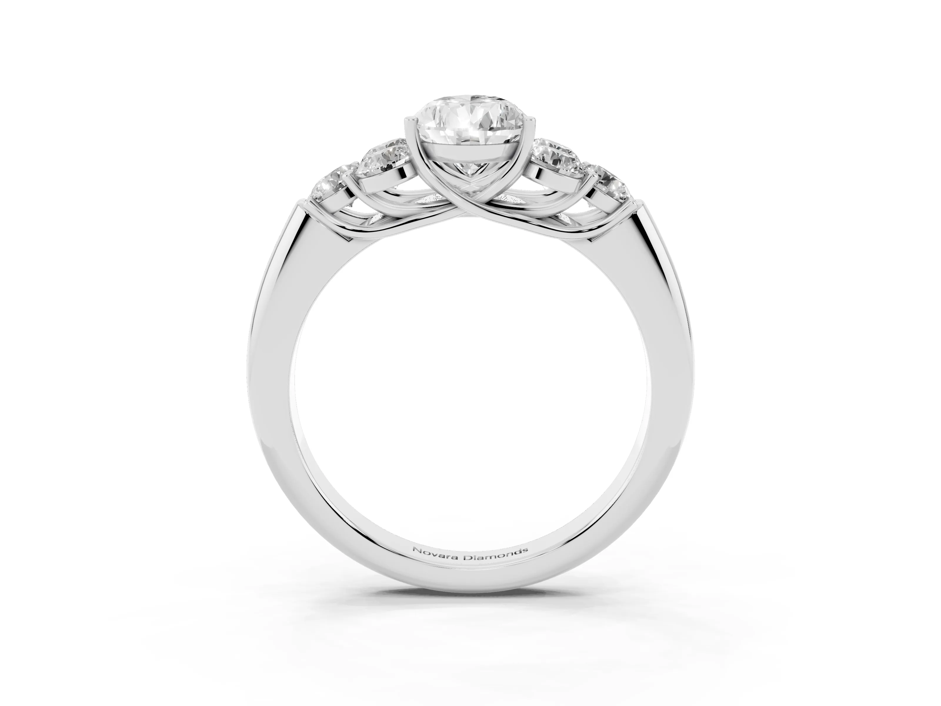 Pear Cut Diamond Cluster Ring Set in Platinum with Round Accent Stones and Prong Setting on a Plain Band