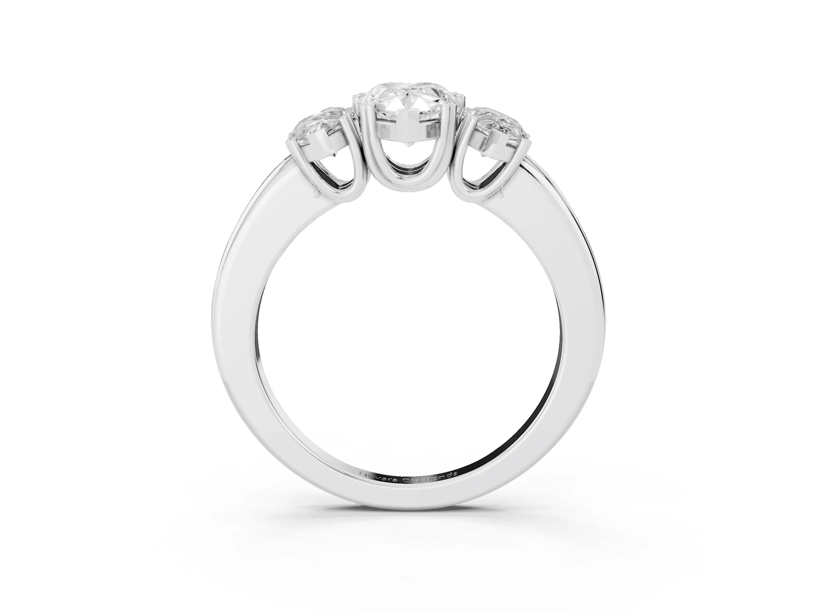 Pear Cut Diamond Three-Stone Ring Set in Platinum with Polished Channel-Set Band