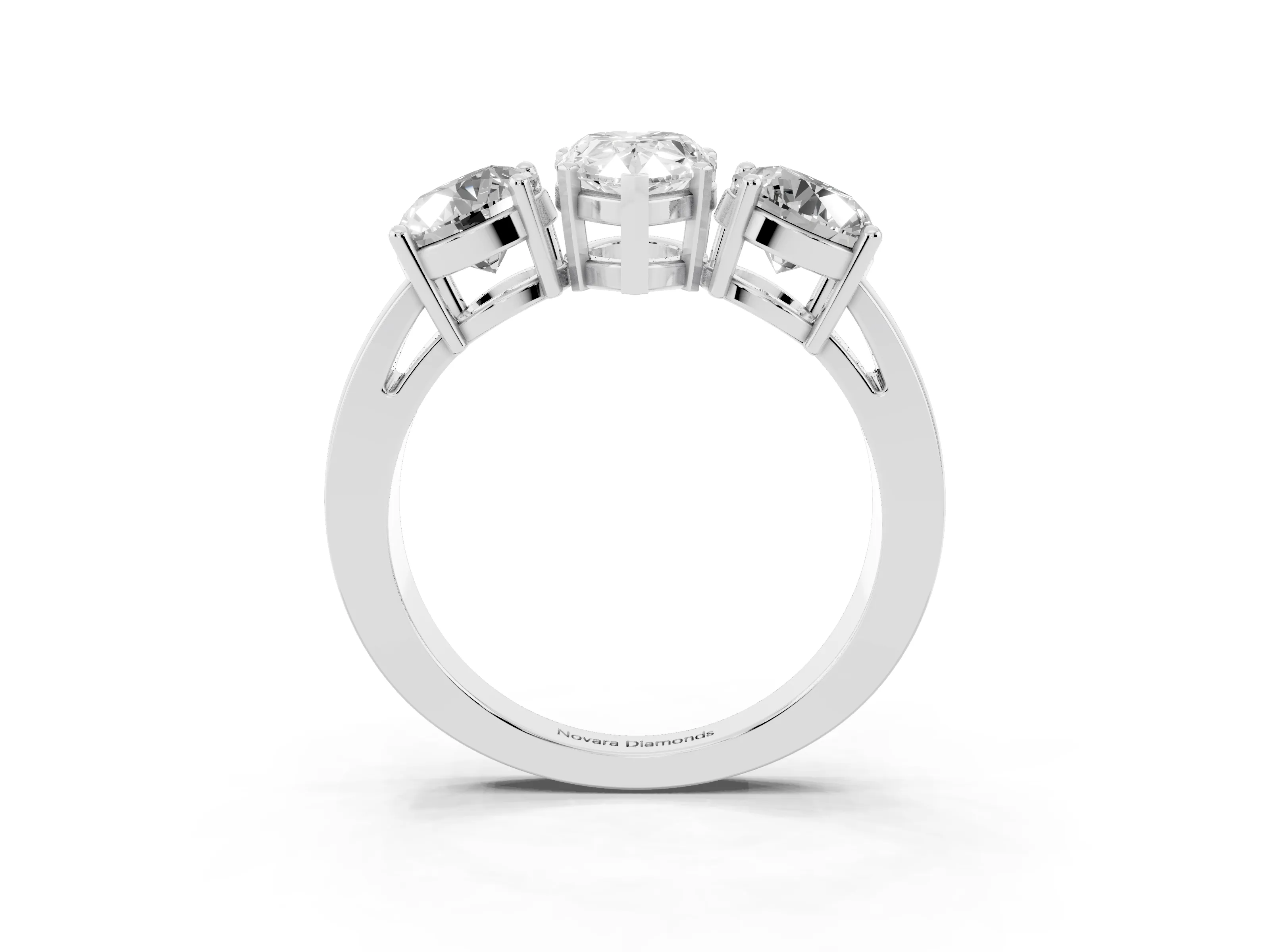 Pear Cut Diamond Three-Stone Ring Set in White gold with Round Side Stones and Classic Band