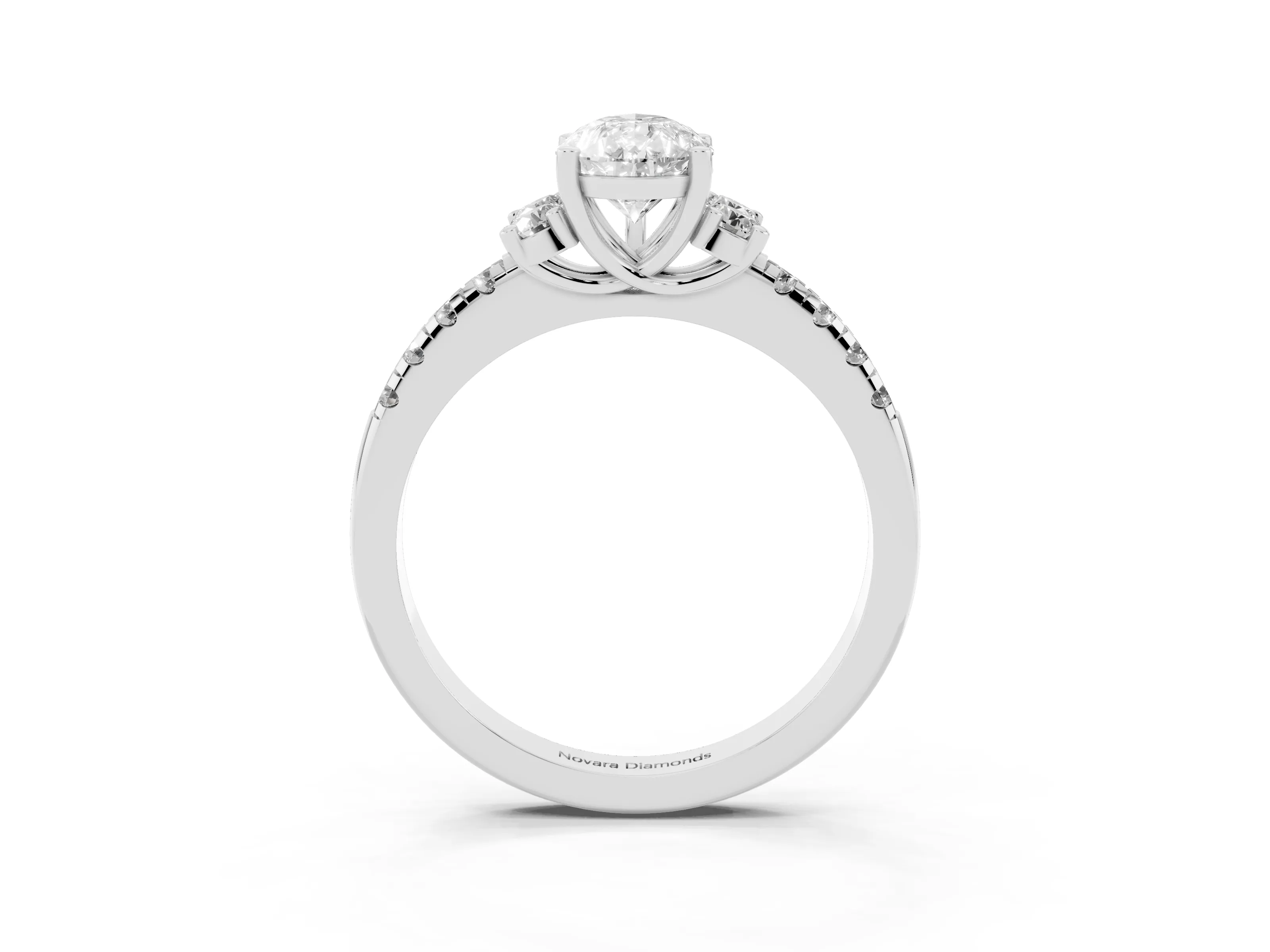 Pear Cut Diamond Three-Stone Pavé Ring Set in Platinum with Prong Setting