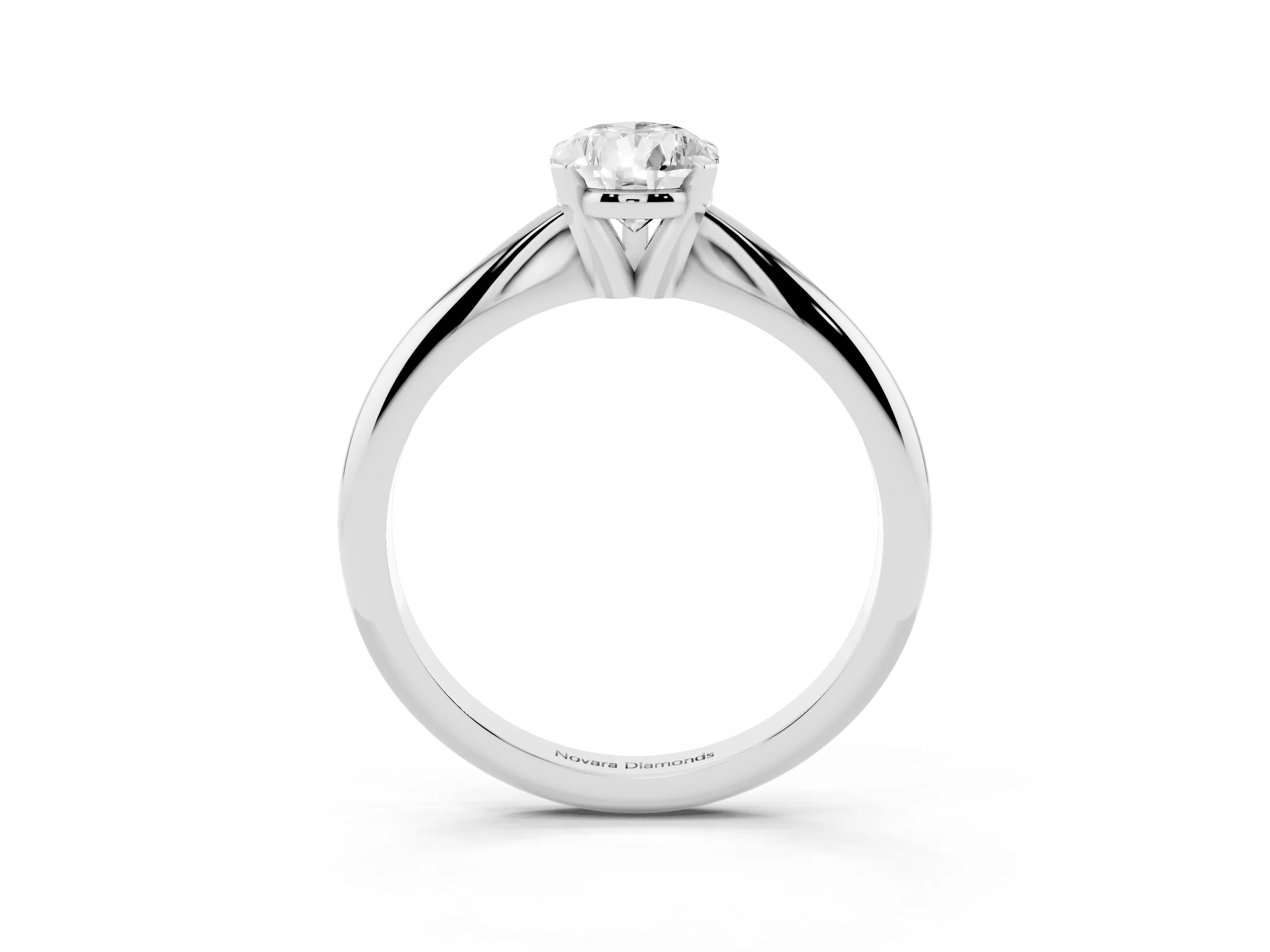Pear Cut Diamond Solitaire Ring Set in Platinum with Prong Setting on a Plain Round Band