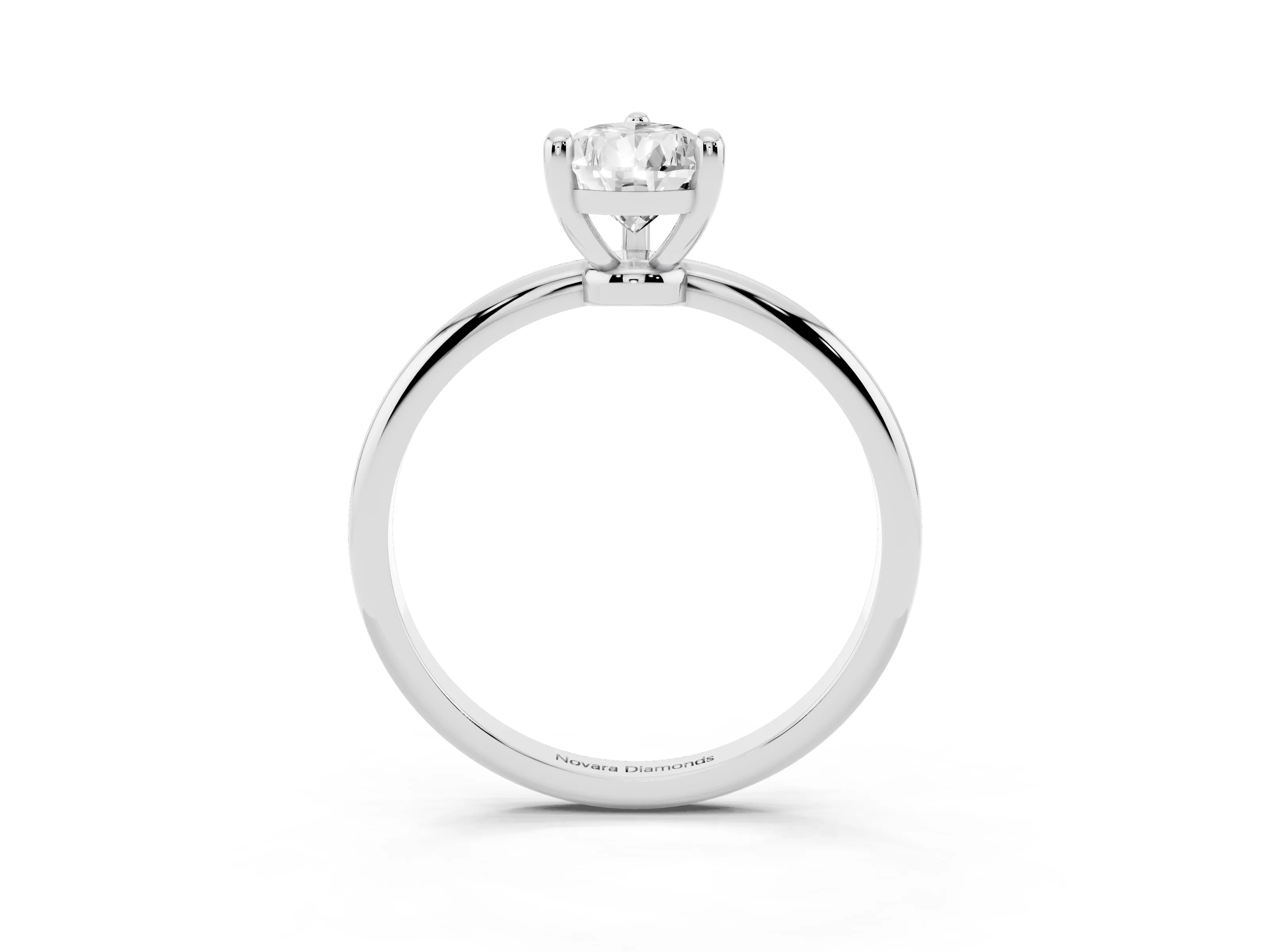 Pear Cut Diamond Solitaire Ring Set in Silver with Secure Prong Setting on a Classic Band