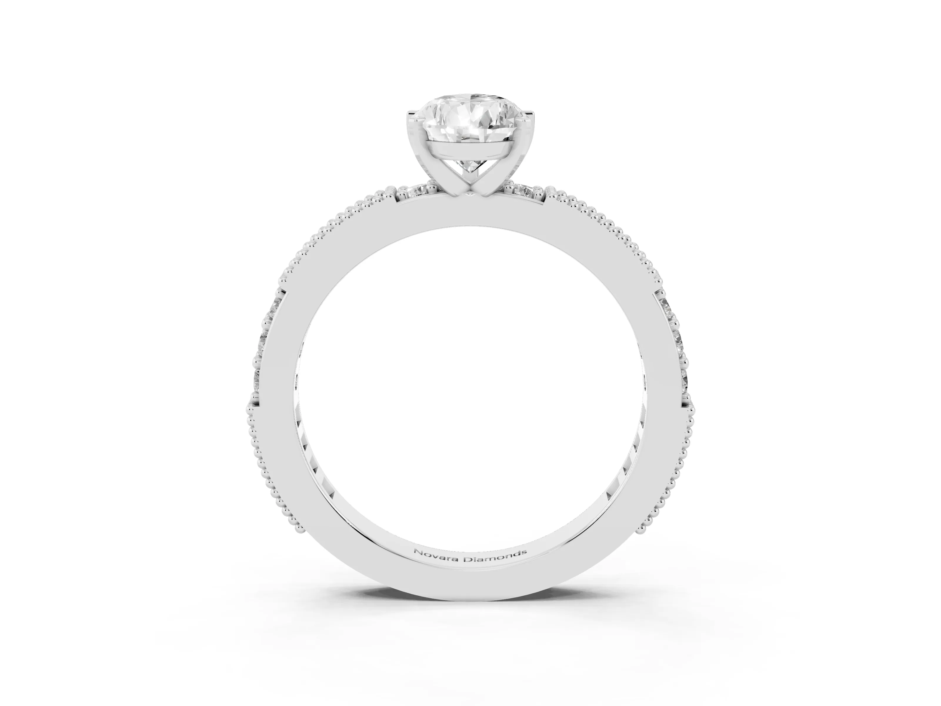 Pear Cut Diamond Solitaire Ring Set in Platinum with Slim Pavé Band and Prong Setting