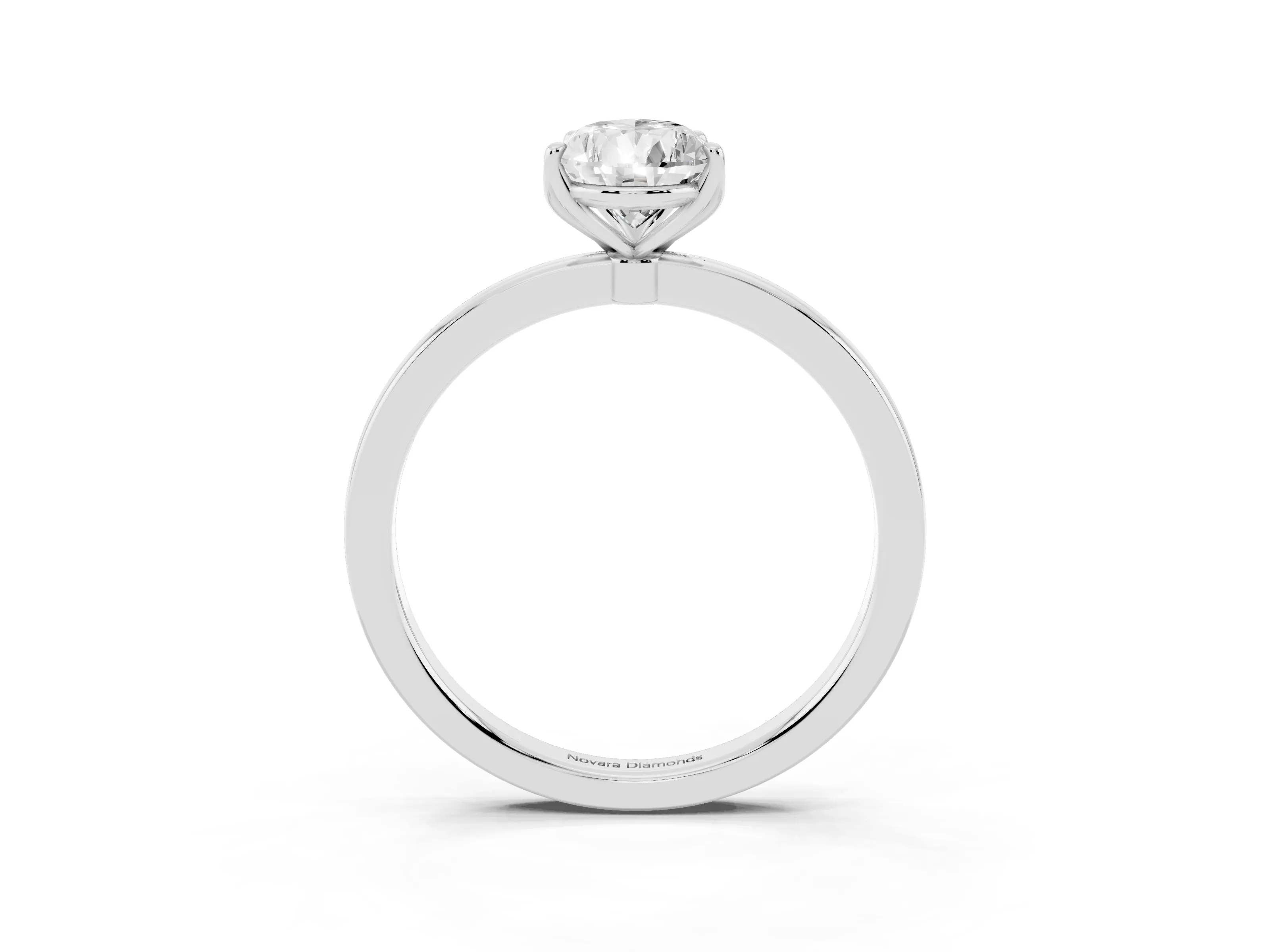 Pear Cut Diamond Solitaire Ring Set in Silver with Prong Setting and Thin Polished Band