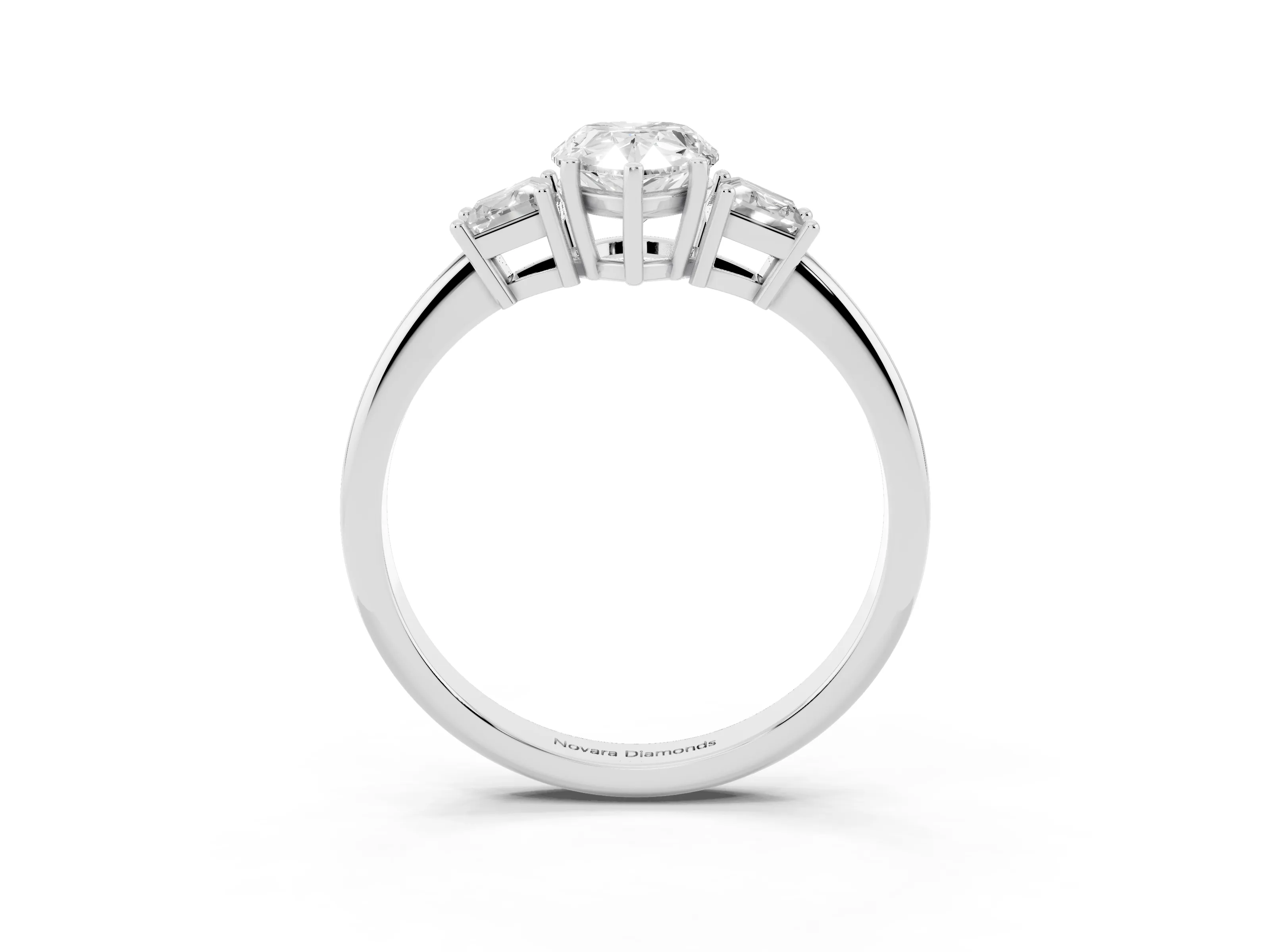 Pear Cut Diamond Three-Stone Ring Set in White gold with Trapezoid Side Stones and Prong Setting