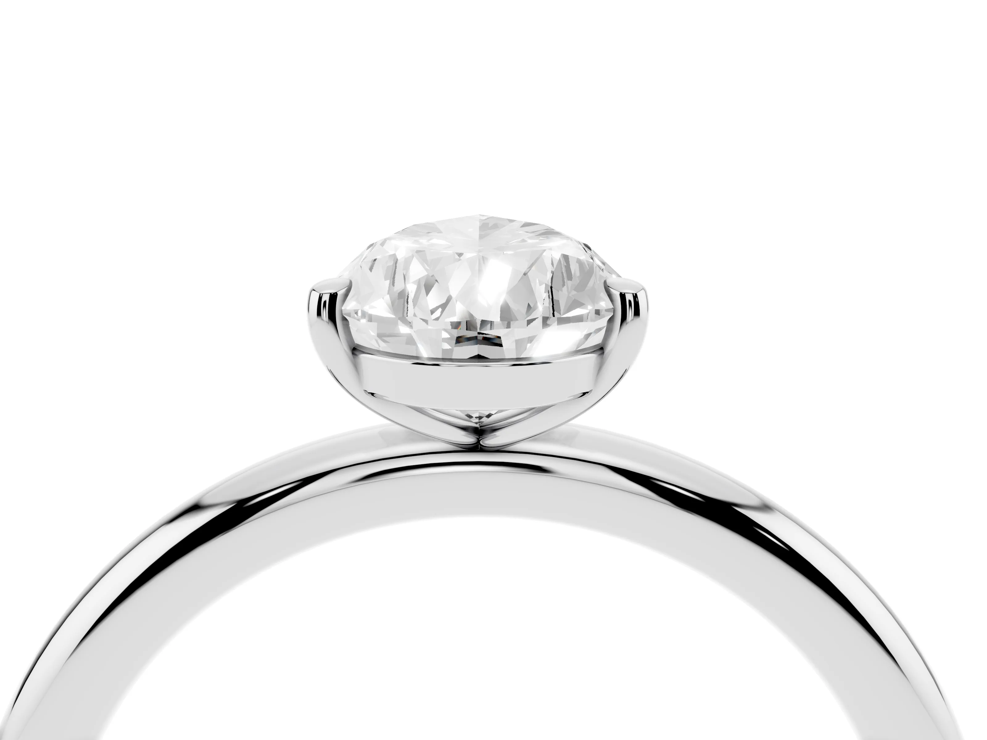 Pear Cut Diamond Solitaire Ring Set in White gold with Prong Setting on a Polished Plain Band