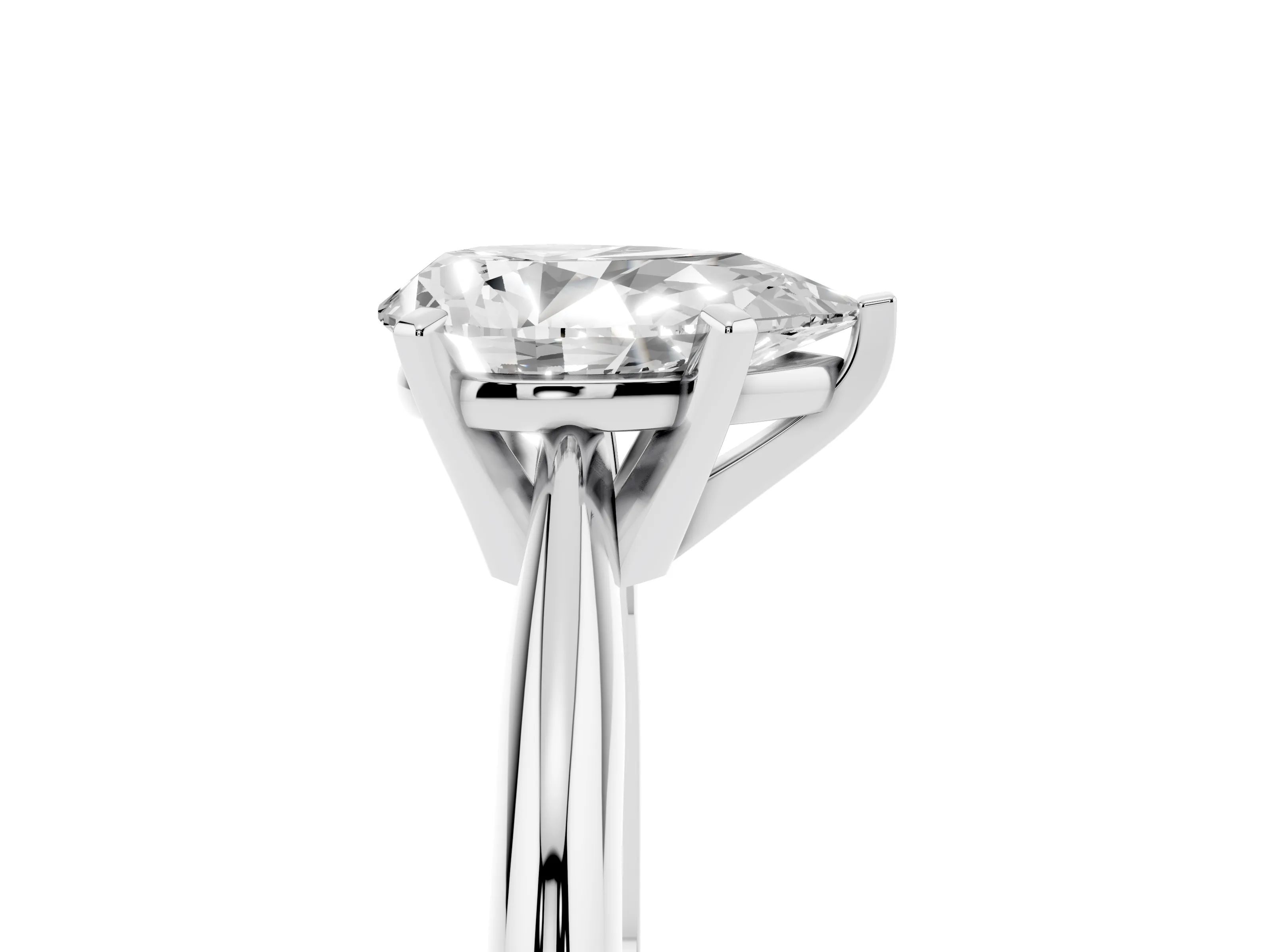 Pear Cut Diamond Solitaire Ring Set in Platinum with Prong Setting on a Plain Round Band