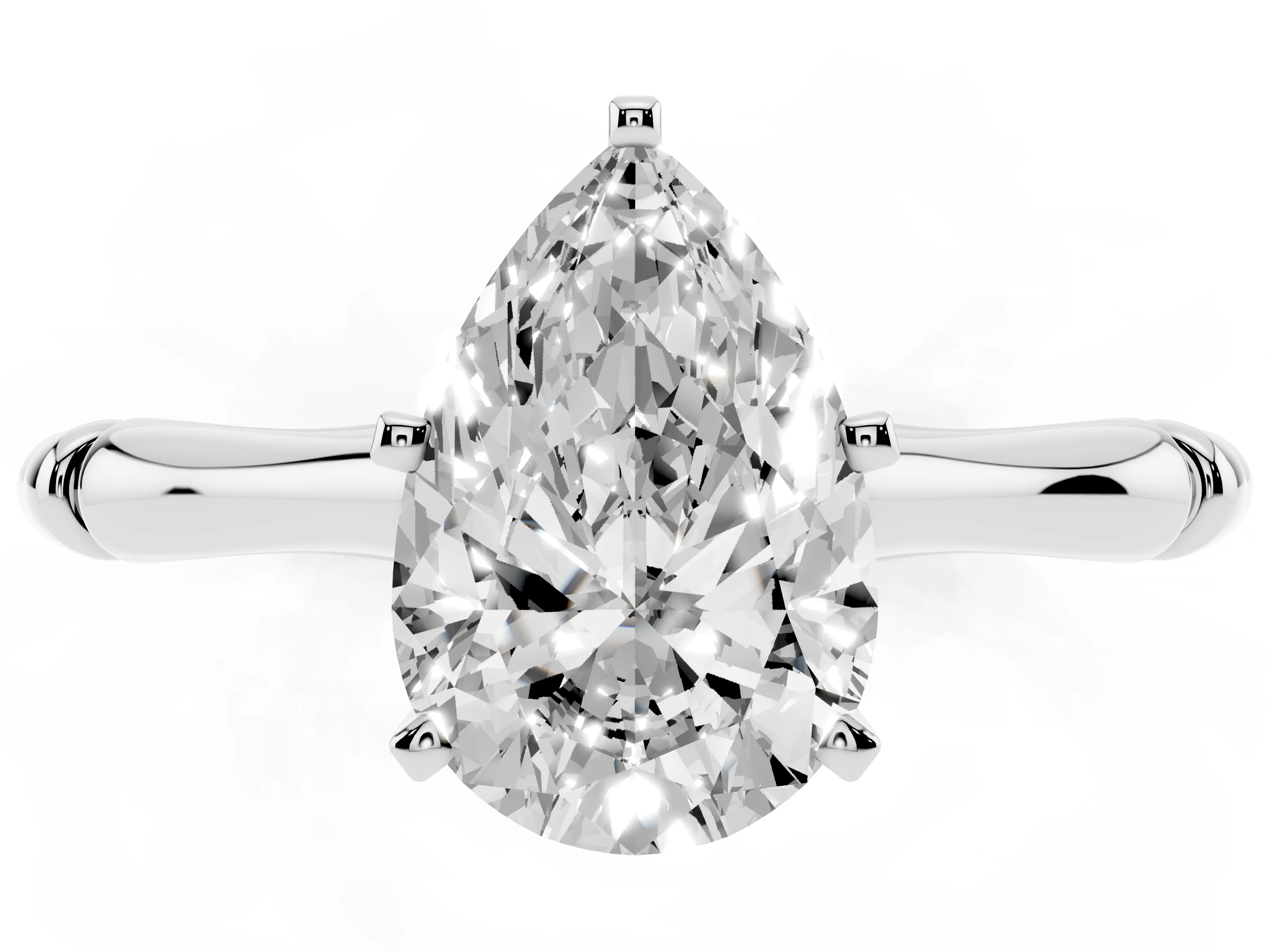 Pear Cut Diamond Solitaire Ring Set in Silver with Bamboo Band and Prong Setting