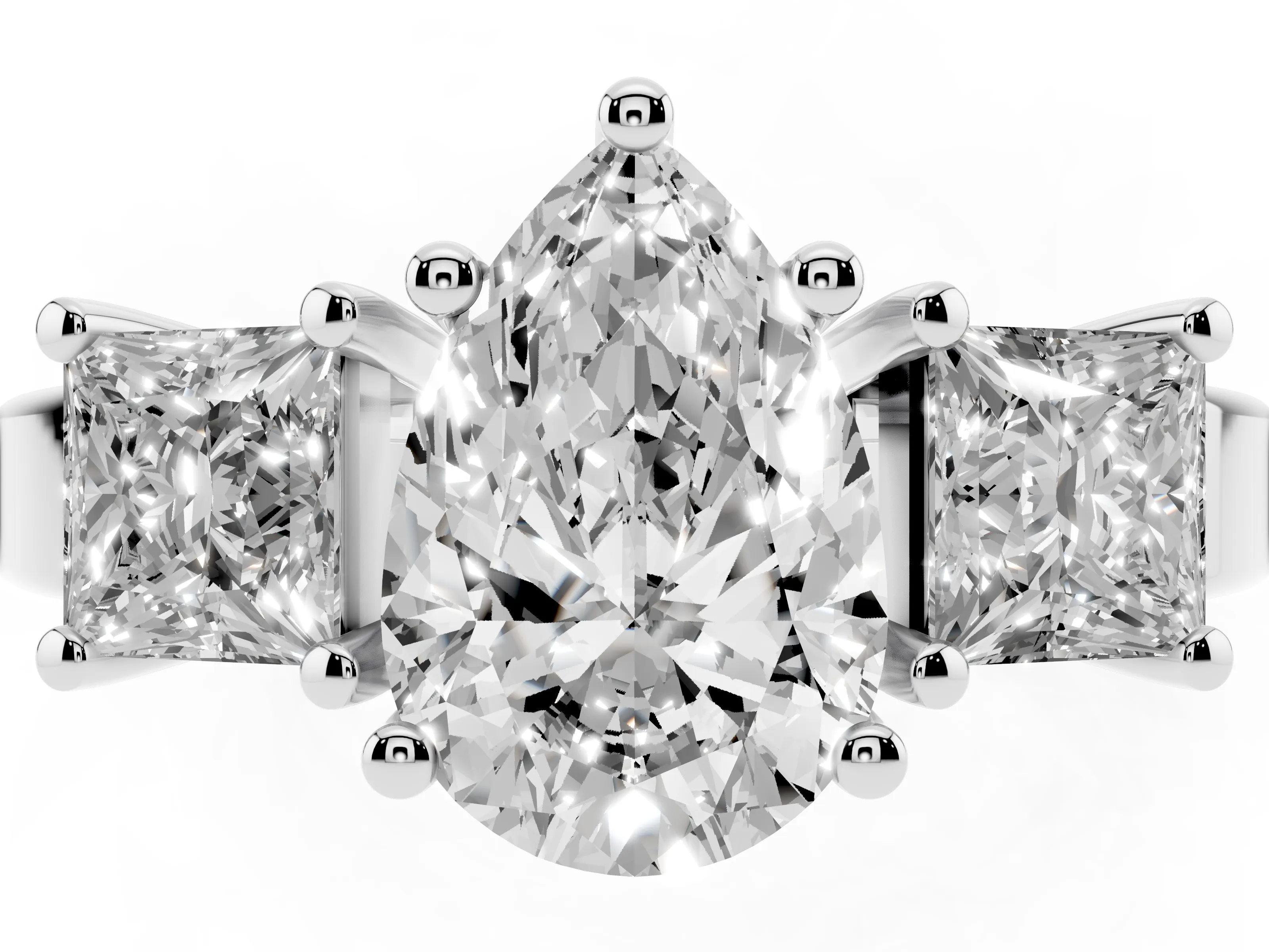Three-Stone Pear Cut Diamond Solitaire Ring Set in Platinum with Prong Setting