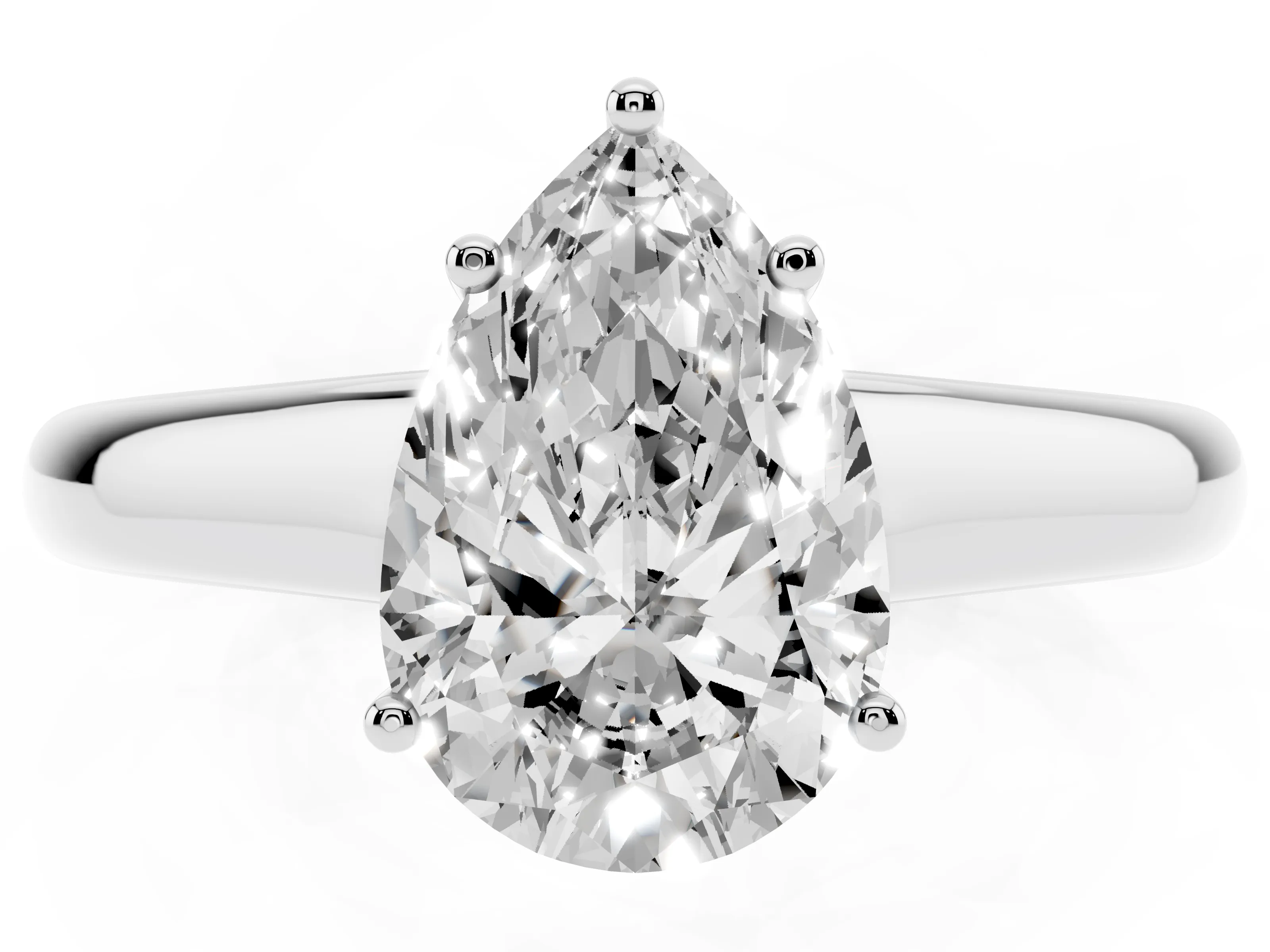 Pear Cut Diamond Solitaire Engagement Ring Set in Platinum with Subtly Tapered Band and Prong Setting