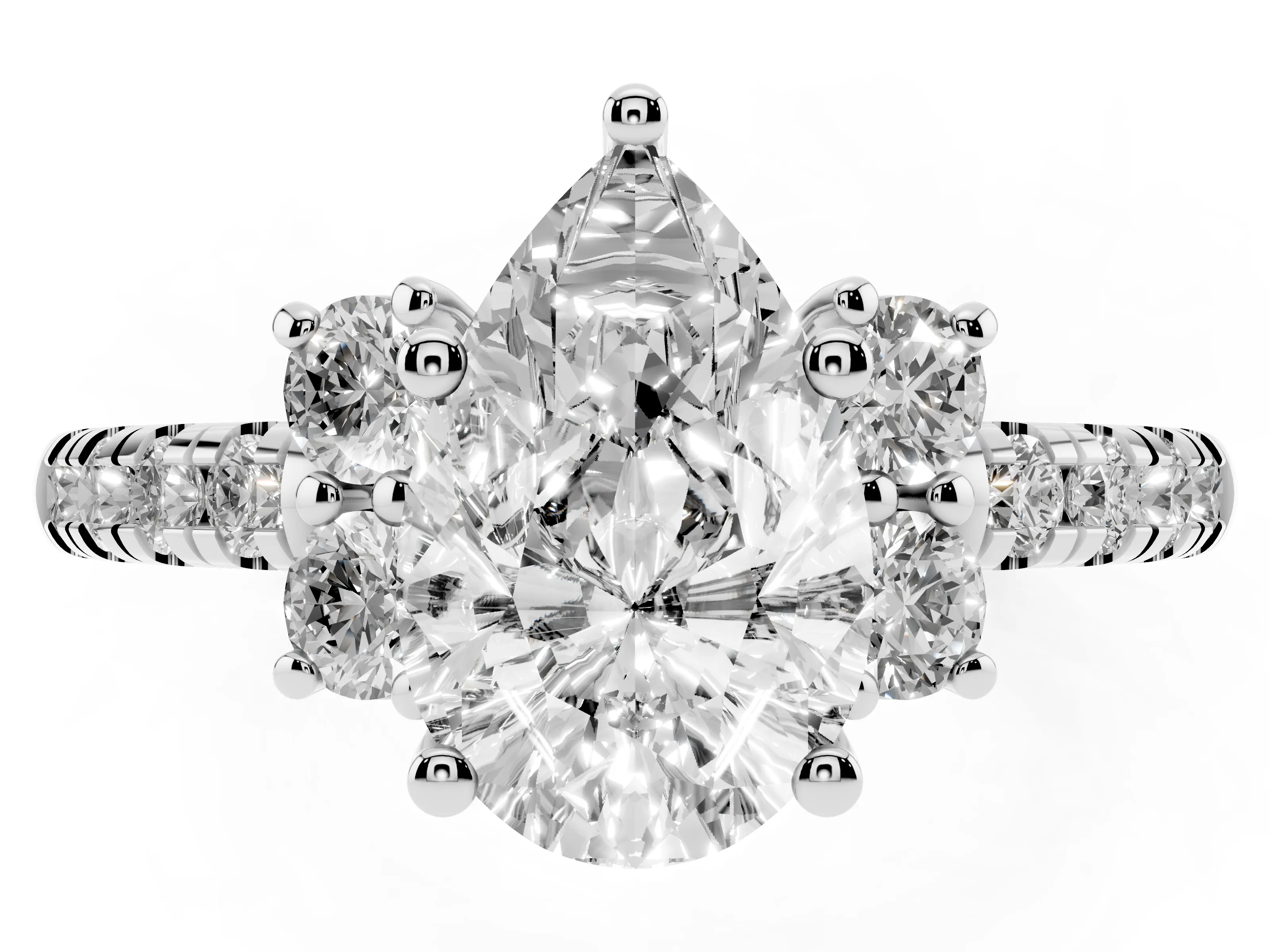 Pear Cut Diamond Three-Stone Pavé Ring Set in Platinum with Prong Setting