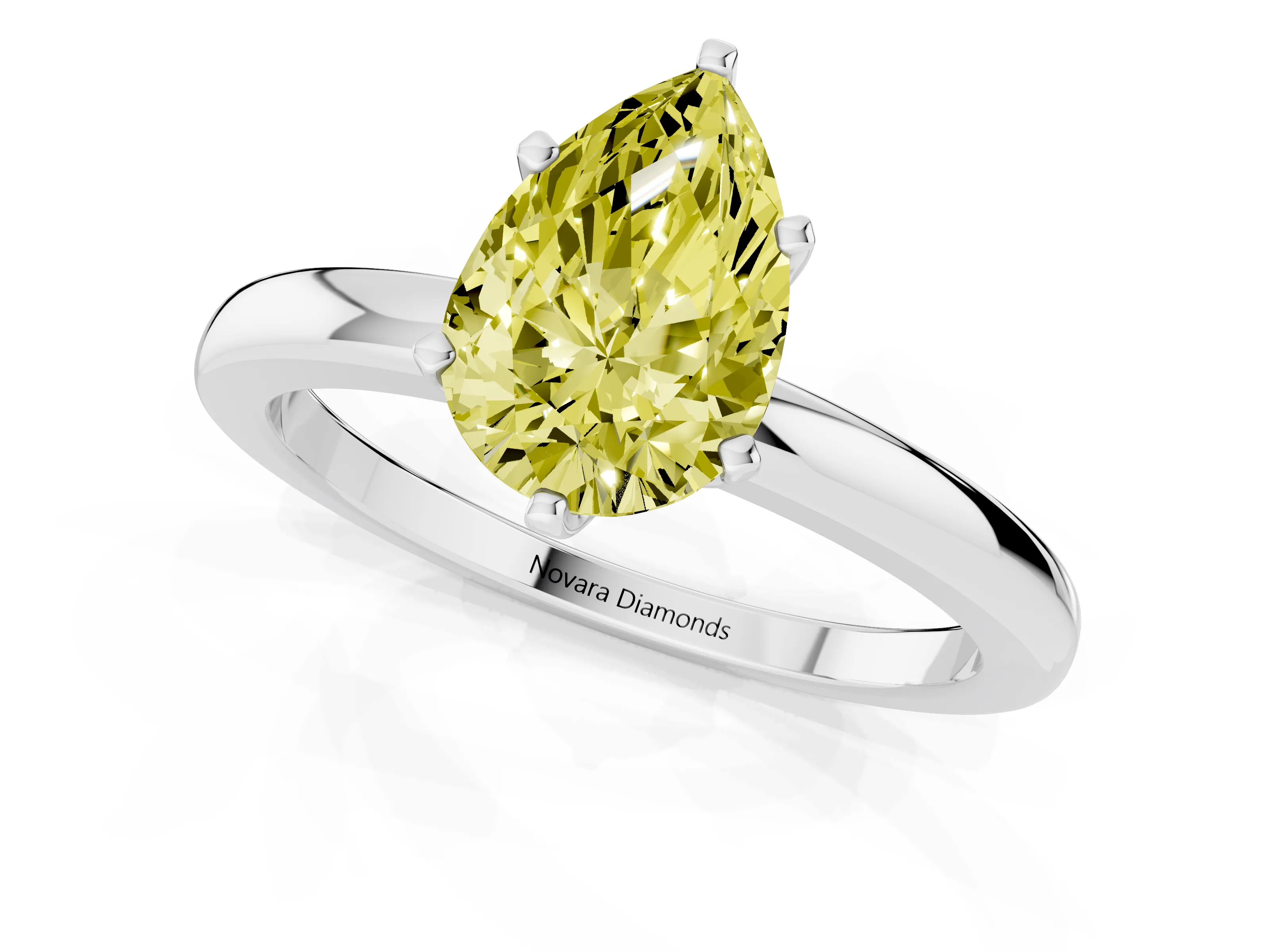 Fancy Yellow Pear Cut Diamond Solitaire Ring Set in Silver with Raised Prong Setting on a Classic Band