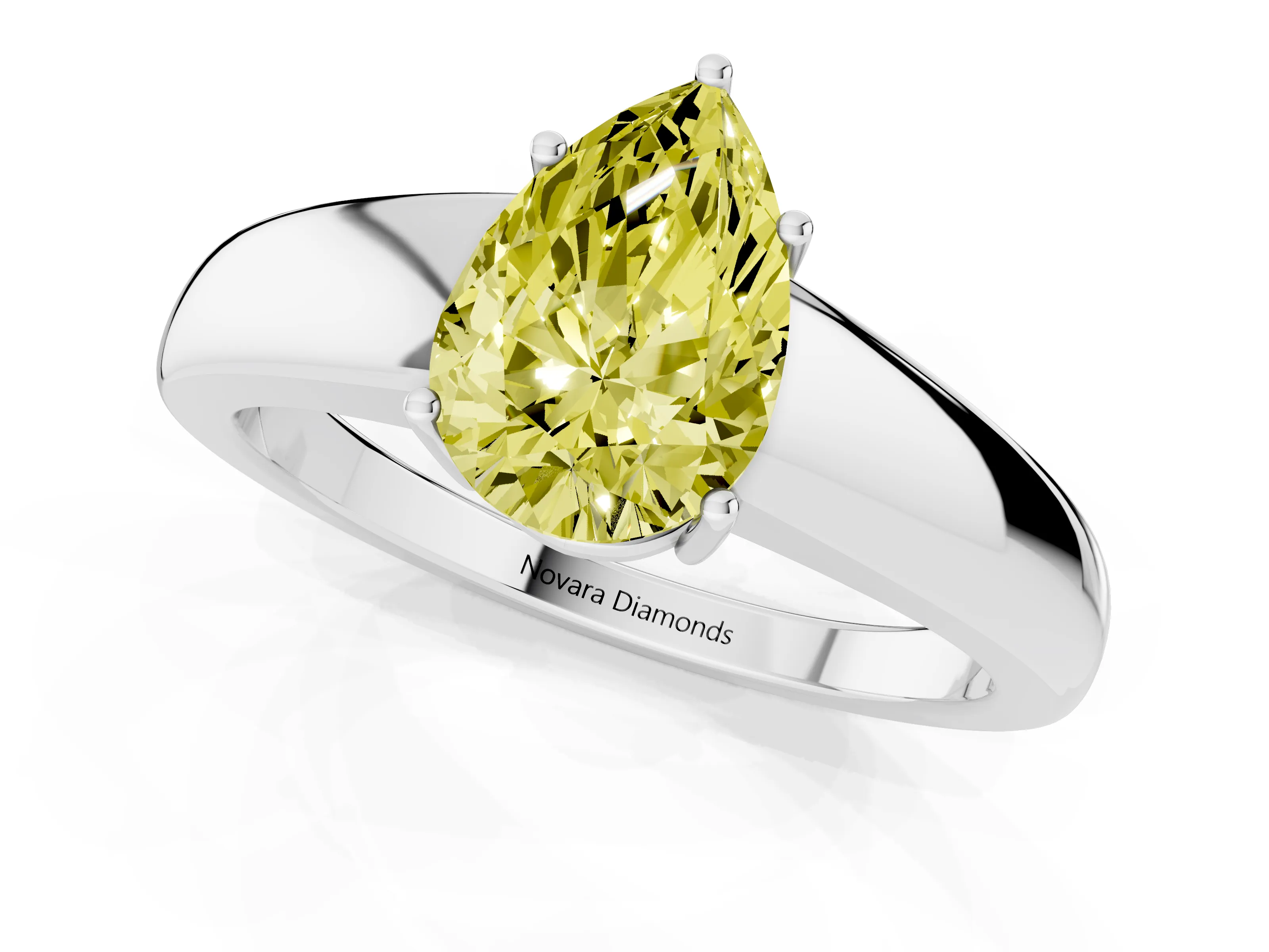 Fancy Yellow Pear Cut Diamond Solitaire Ring Set in White gold with Tapered Band and Prong Setting