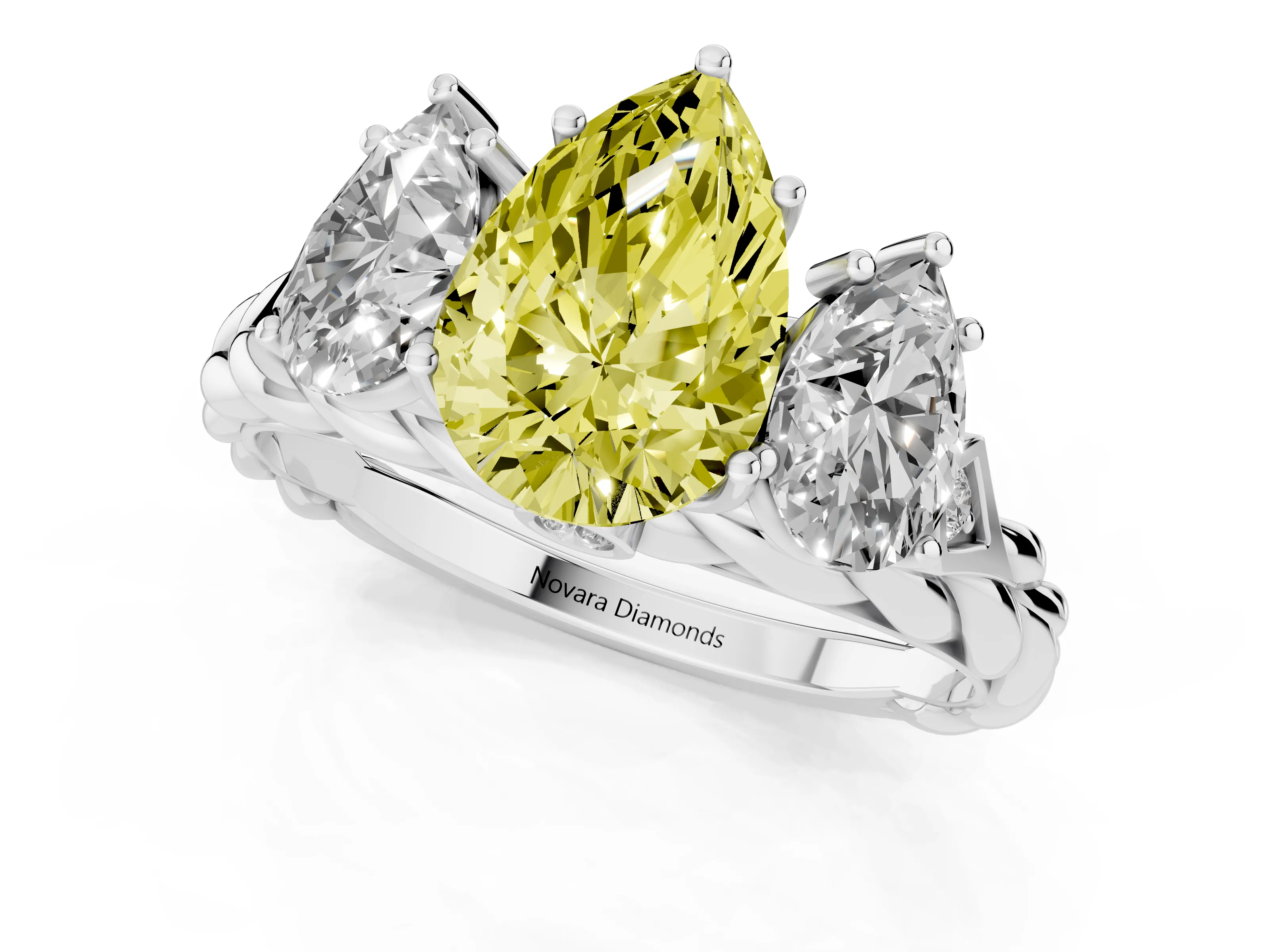 Fancy Yellow Pear Cut Diamond Three-Stone Ring Set in White gold with Braided Band