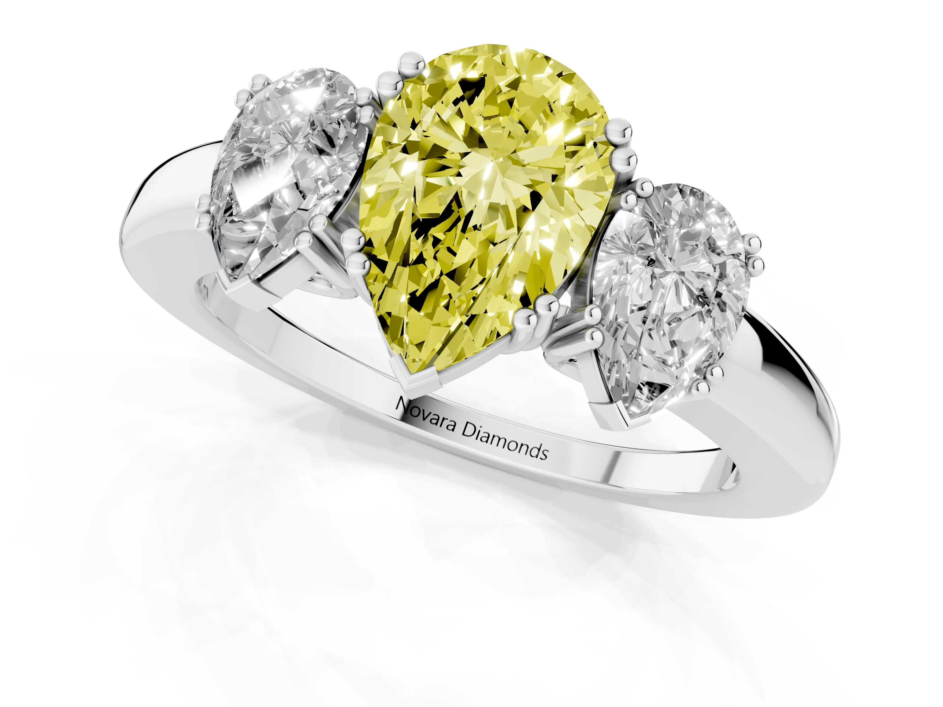 Fancy Yellow Pear Cut Diamond Three-Stone Ring Set in White gold with Polished Channel-Set Band