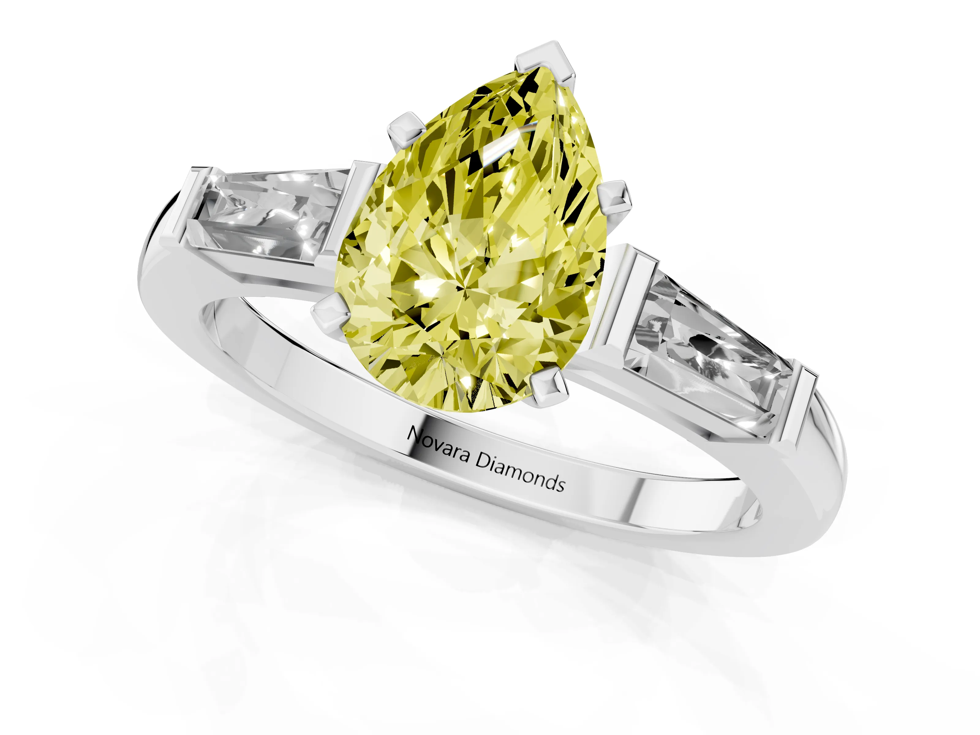 Fancy Yellow Pear Cut Diamond Solitaire Ring Set in White gold with Tapered Baguette Side Stones and Prong Setting