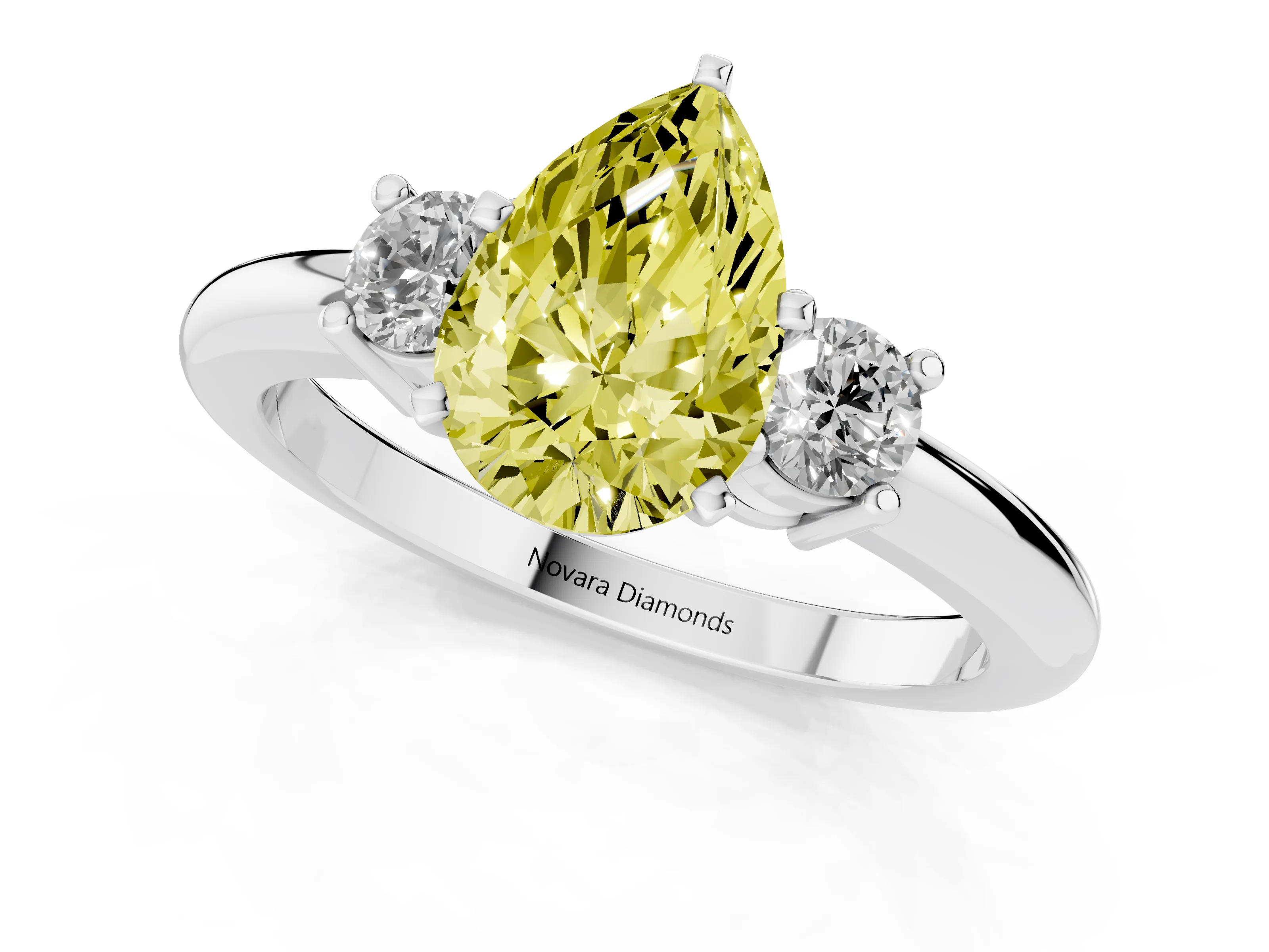 Fancy Yellow Three-Stone Pear Cut Diamond Ring Set in Silver with Prong Setting and Plain Band