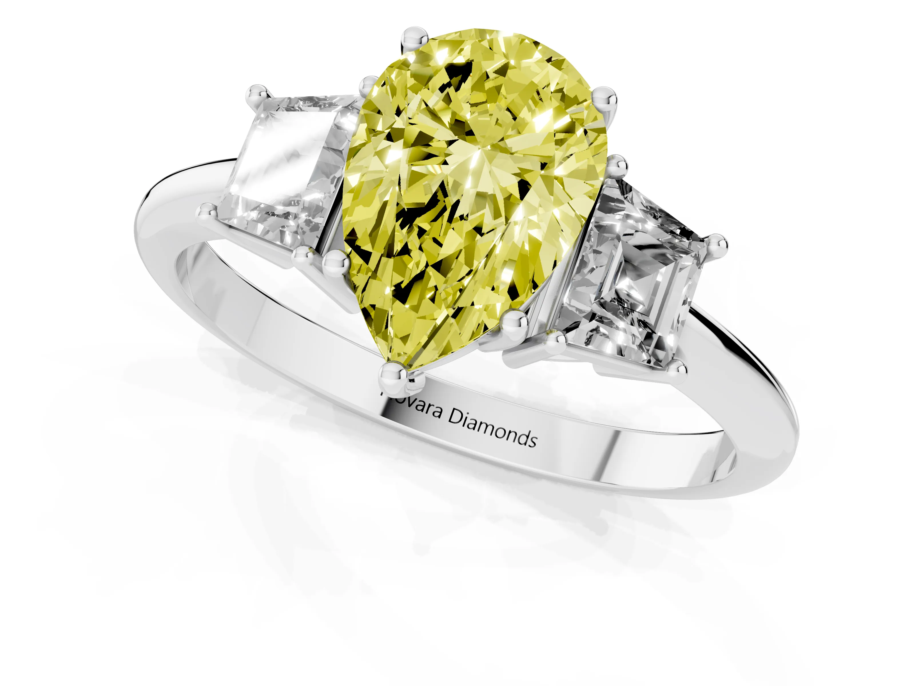 Fancy Yellow Pear Cut Diamond Three-Stone Ring Set in White gold with Trapezoid Side Stones and Prong Setting
