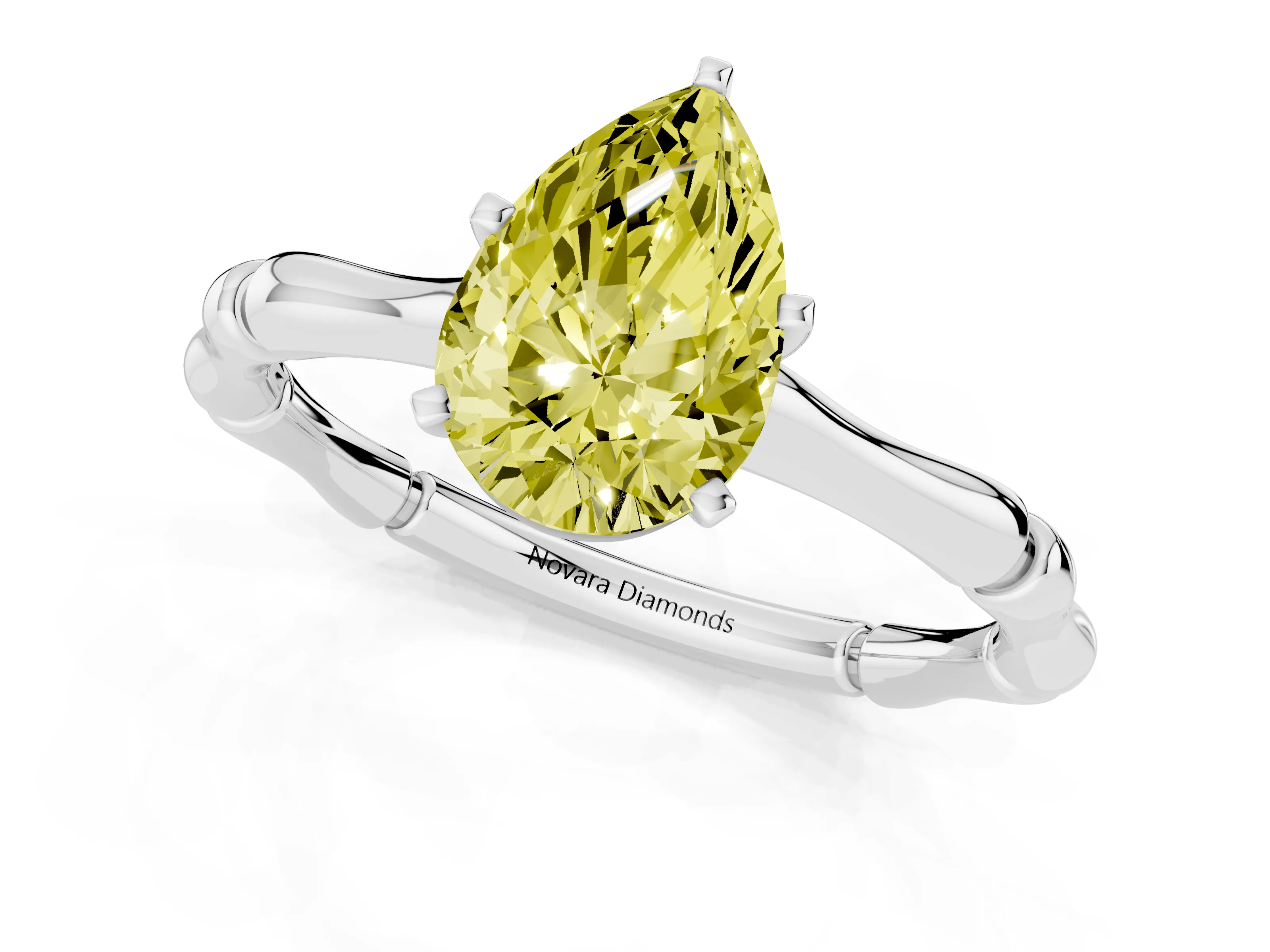 Fancy Yellow Pear Cut Diamond Solitaire Ring Set in Platinum with Bamboo Band and Prong Setting