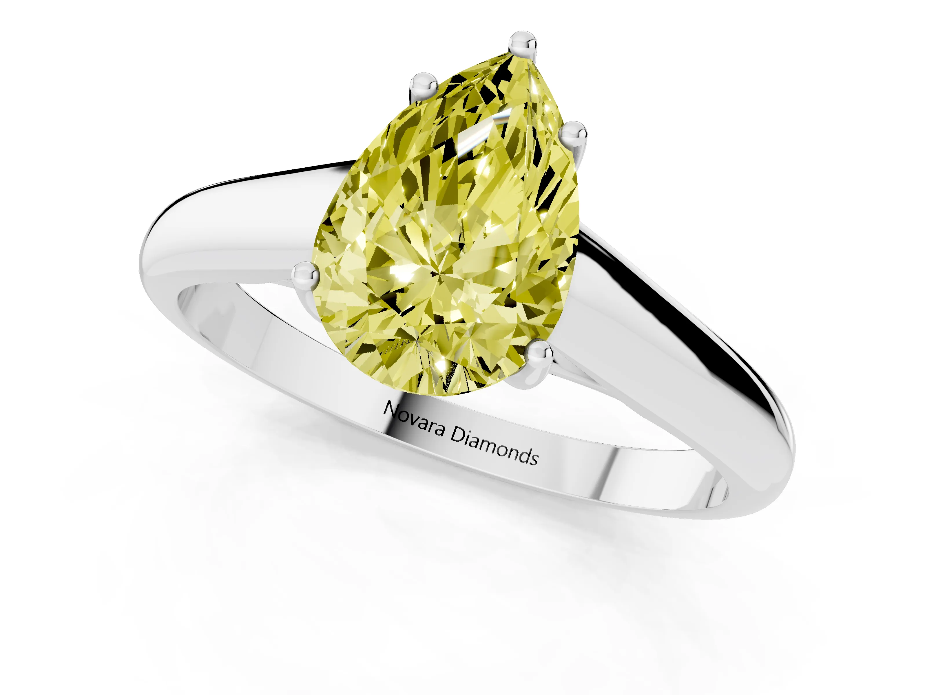 Fancy Yellow Pear Cut Diamond Solitaire Engagement Ring Set in White gold with Subtly Tapered Band and Prong Setting